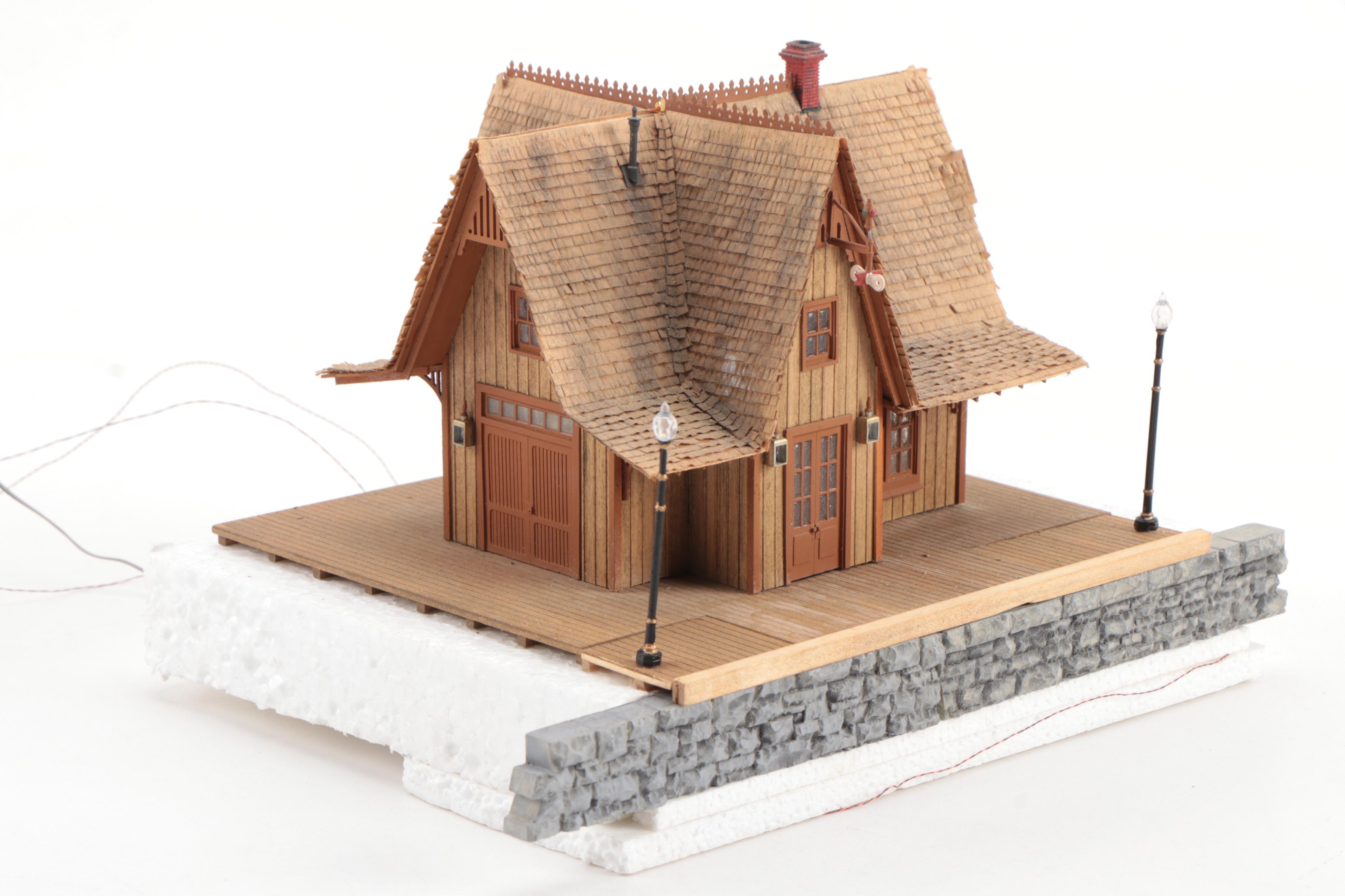 Model Train Structures Including Shops, Houses and a Church