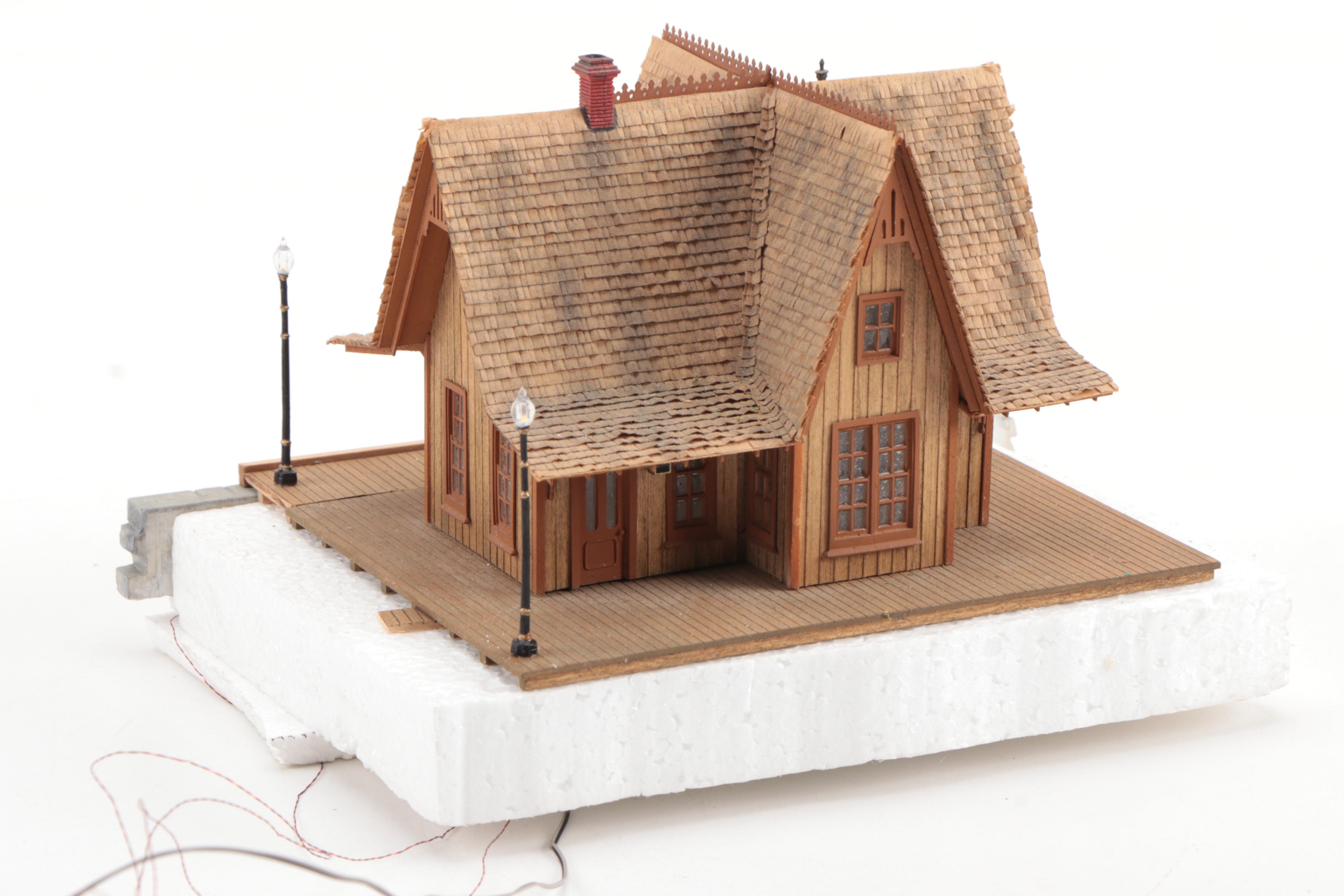 Model Train Structures Including Shops, Houses and a Church