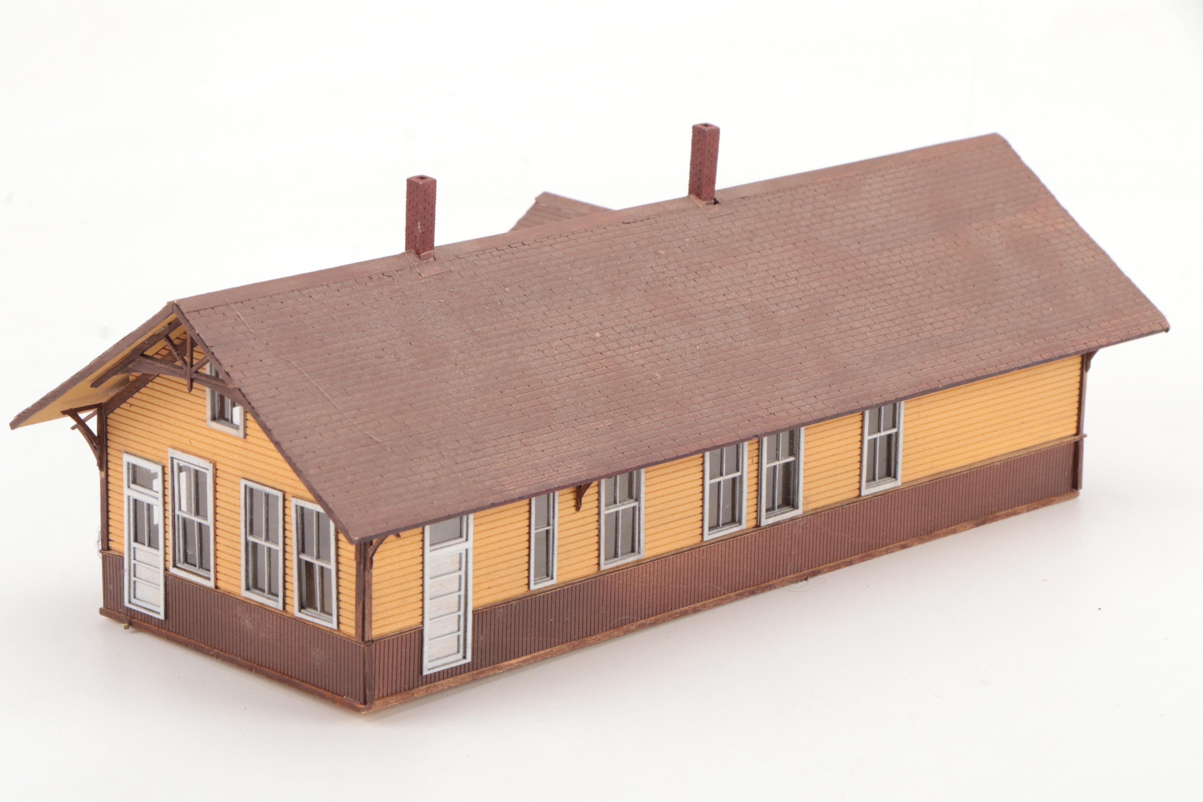 Model Train Structures Including Shops, Houses and a Church