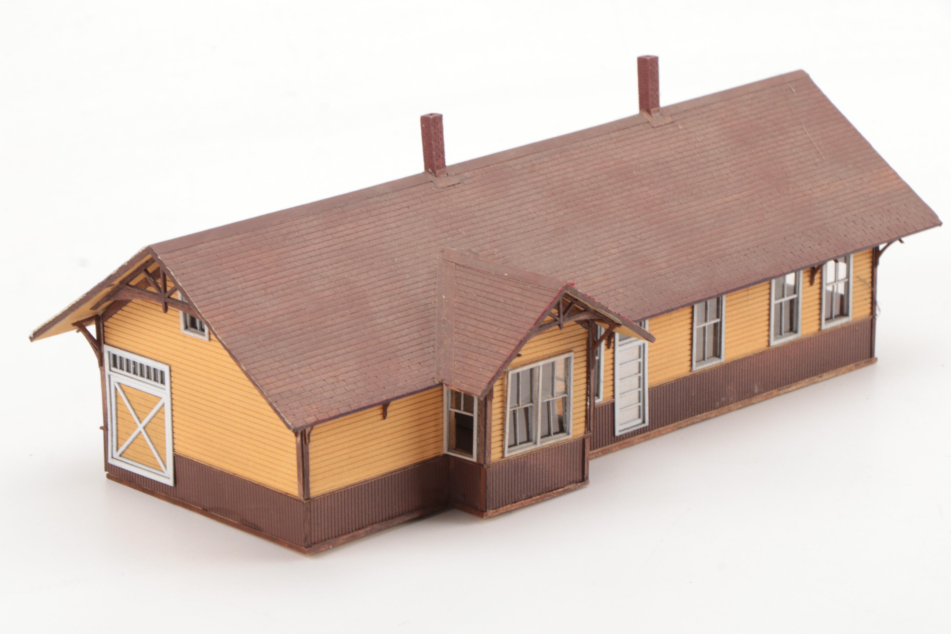 Model Train Structures Including Shops, Houses and a Church