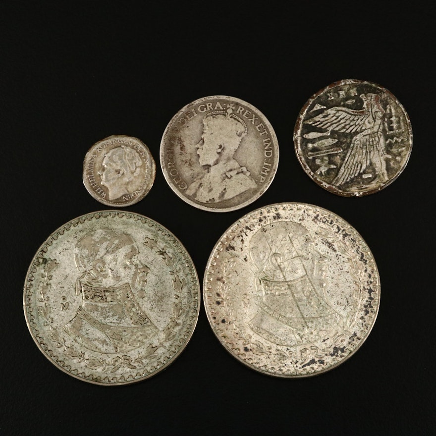 Collection of Foreign Silver Coins and Egyptian Themed Token