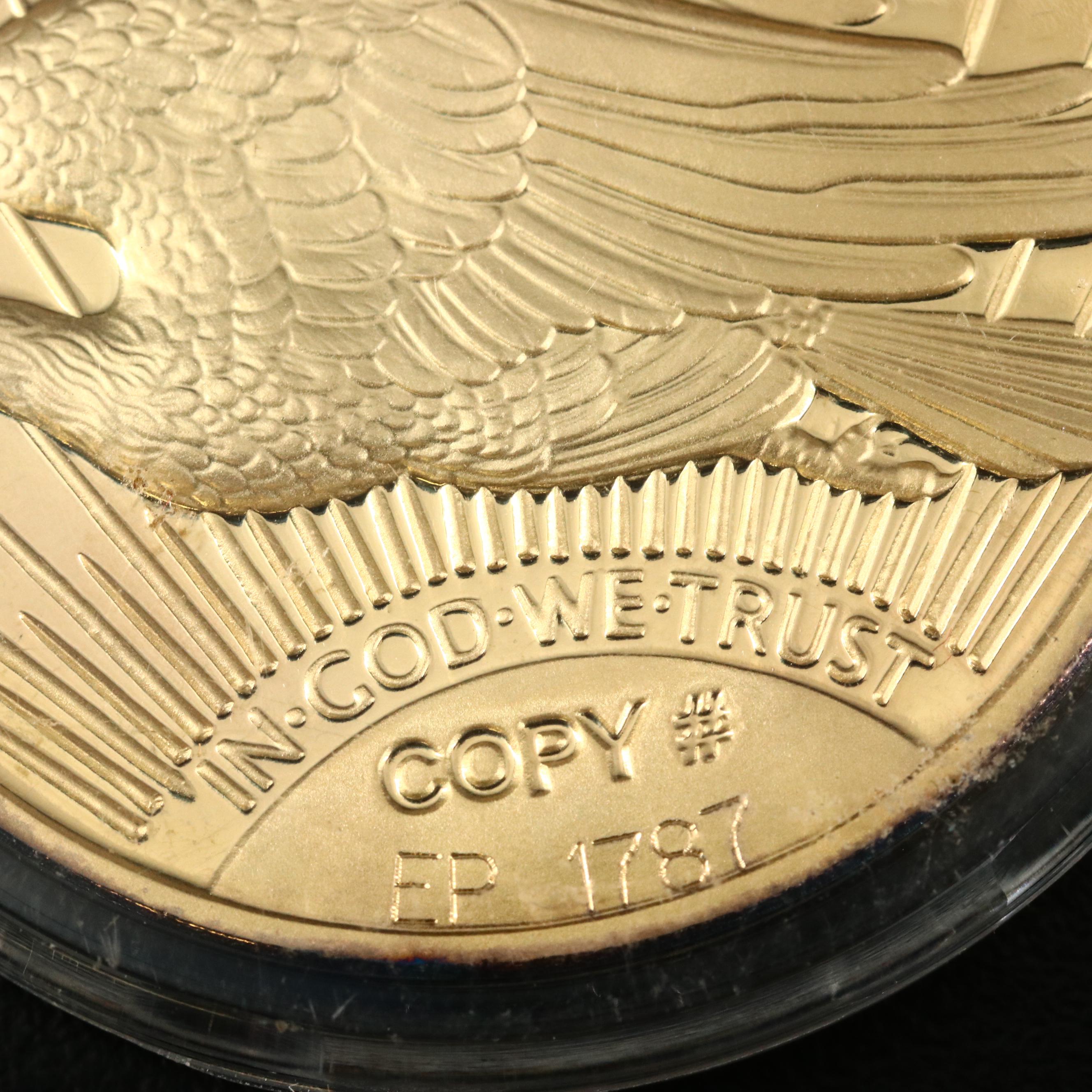 Four 1933 Gold Double Eagle Replicas
