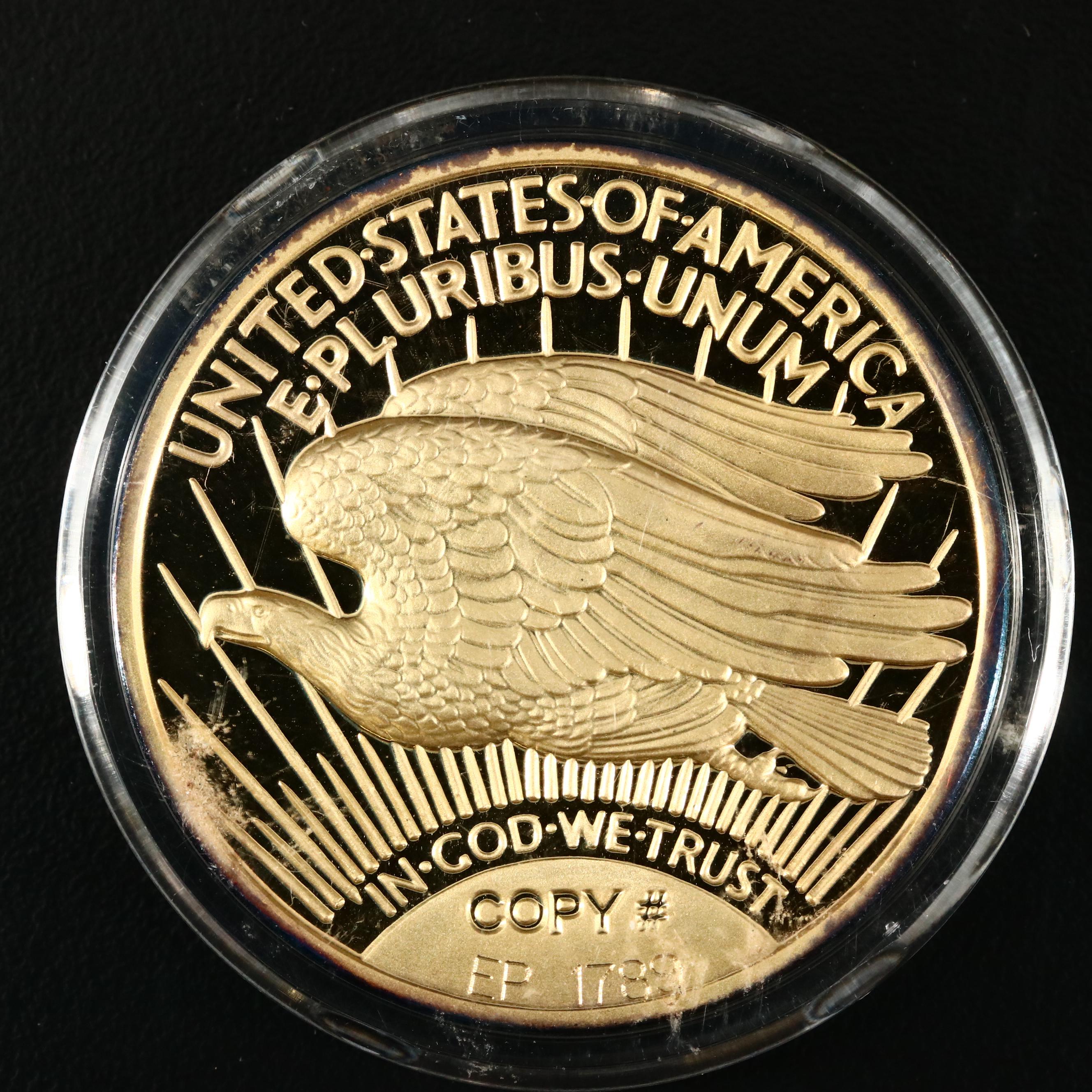 Four 1933 Gold Double Eagle Replicas