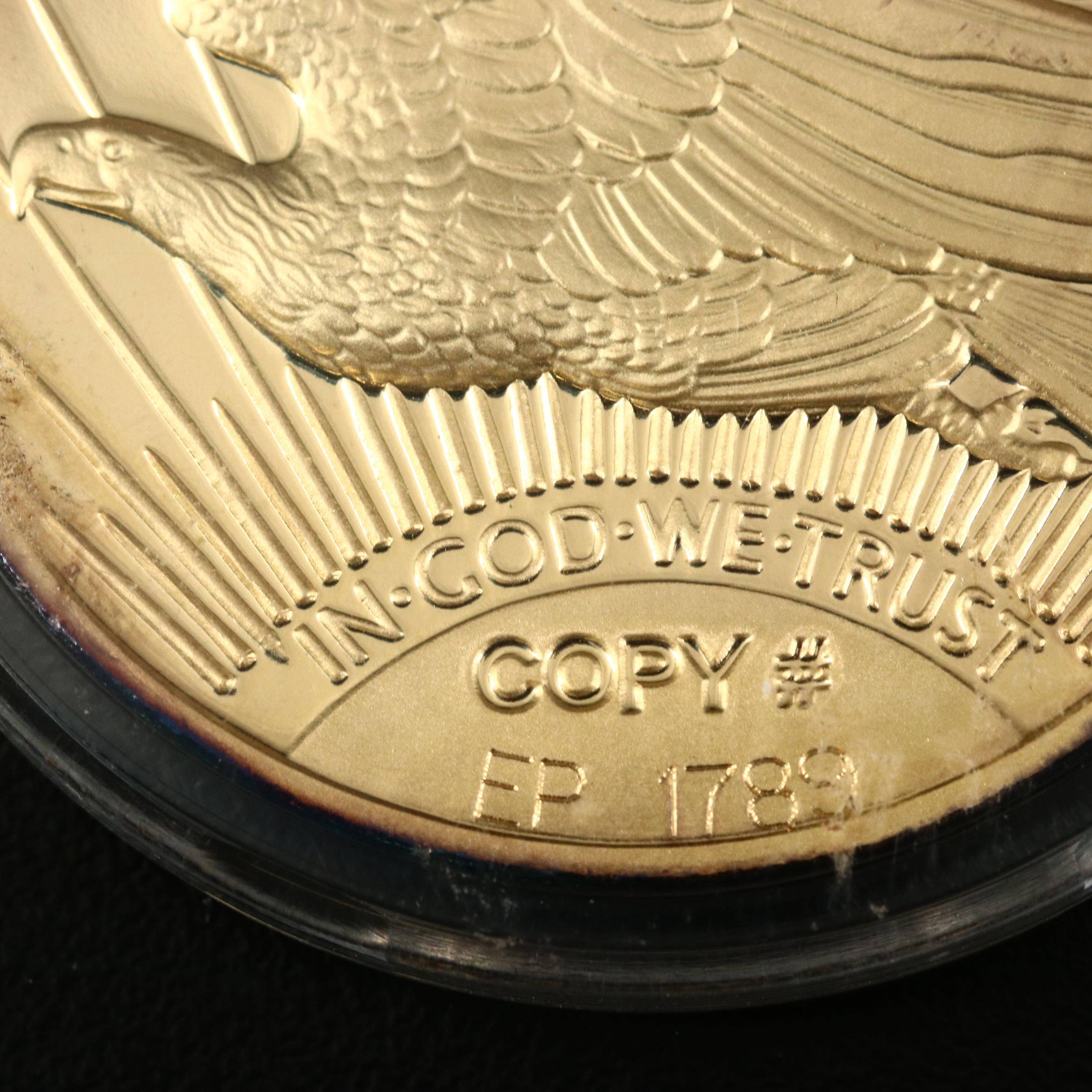 Four 1933 Gold Double Eagle Replicas