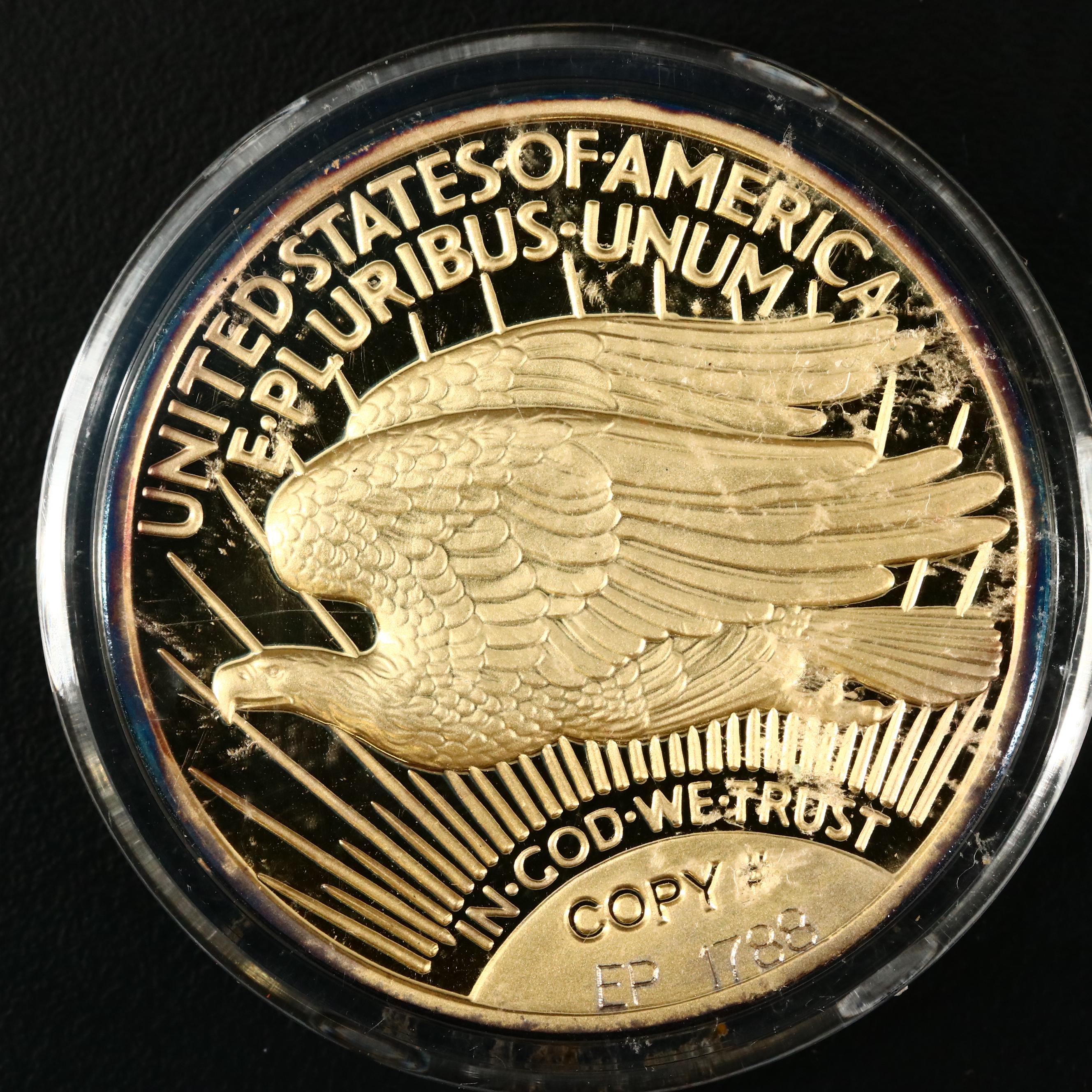 Four 1933 Gold Double Eagle Replicas