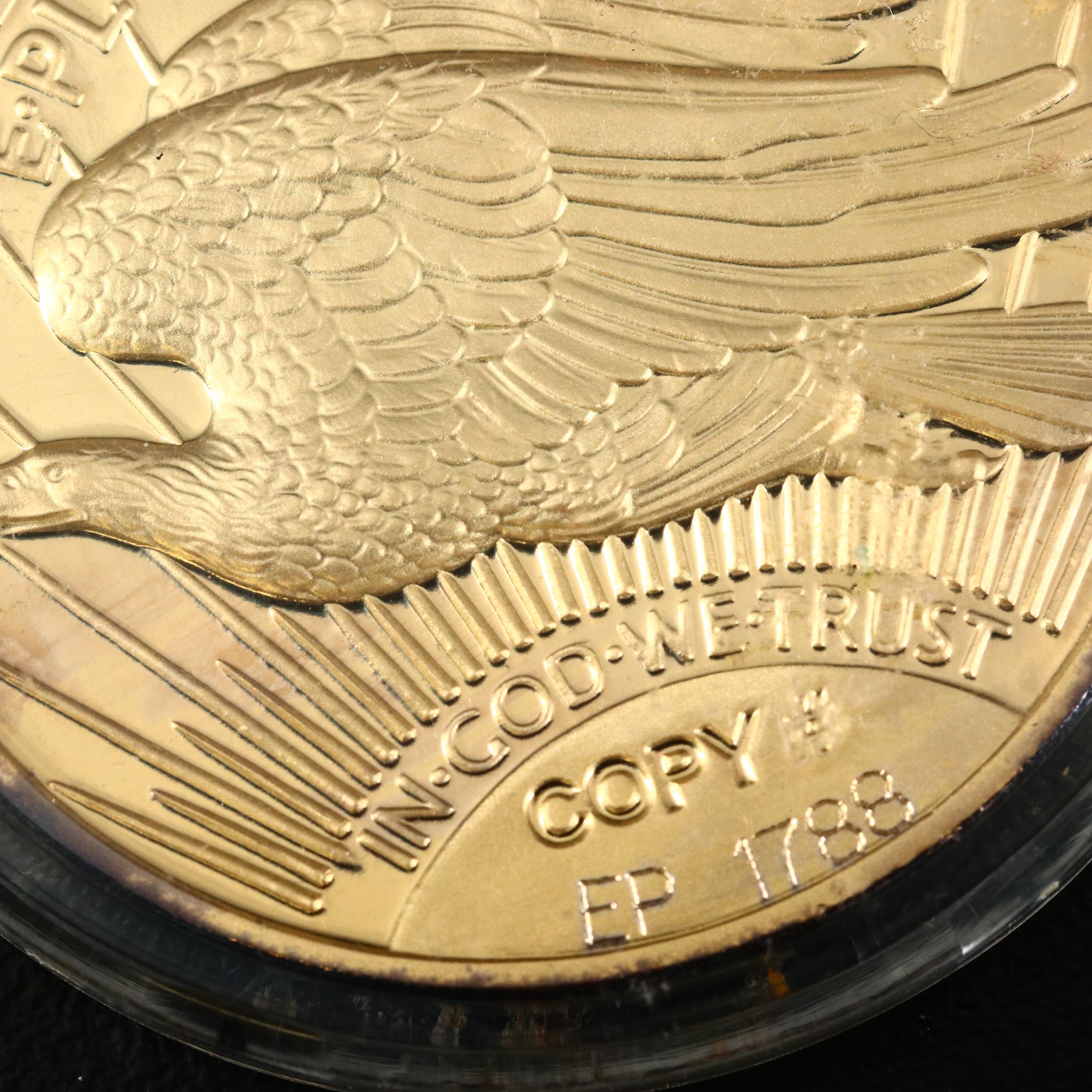 Four 1933 Gold Double Eagle Replicas