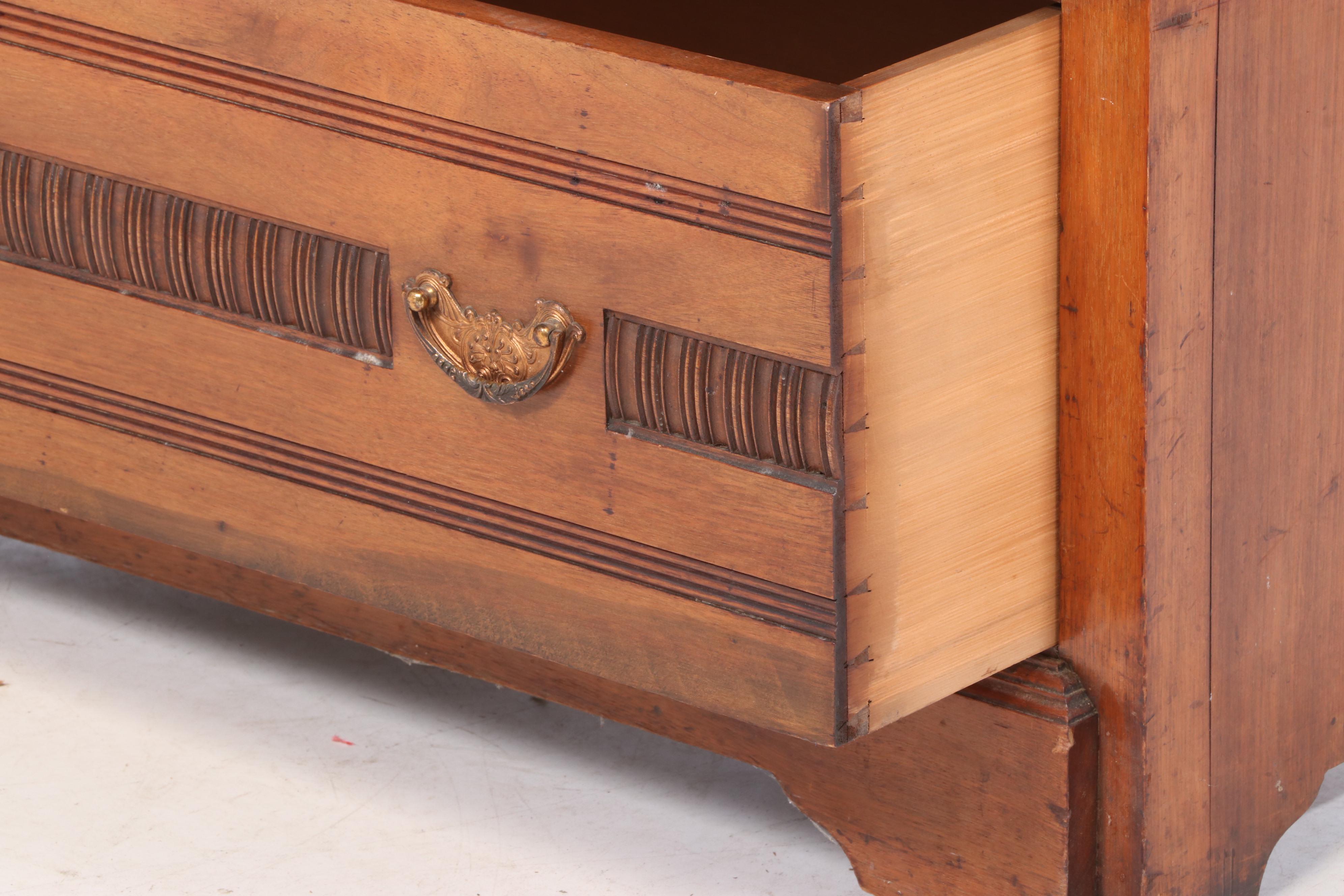 T. Simpson & Sons Victorian Eastlake Walnut Wardrobe, Late 19th Century