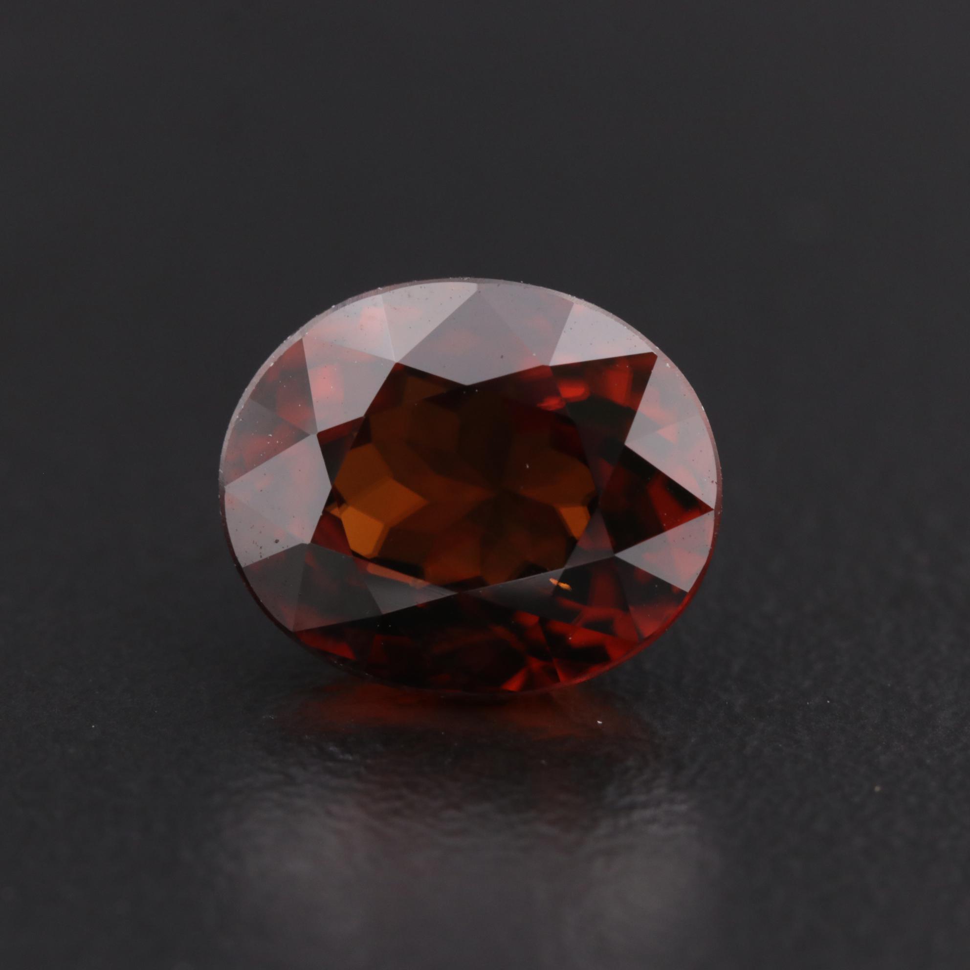 Loose 8.25 CT Oval Faceted Red Zircon