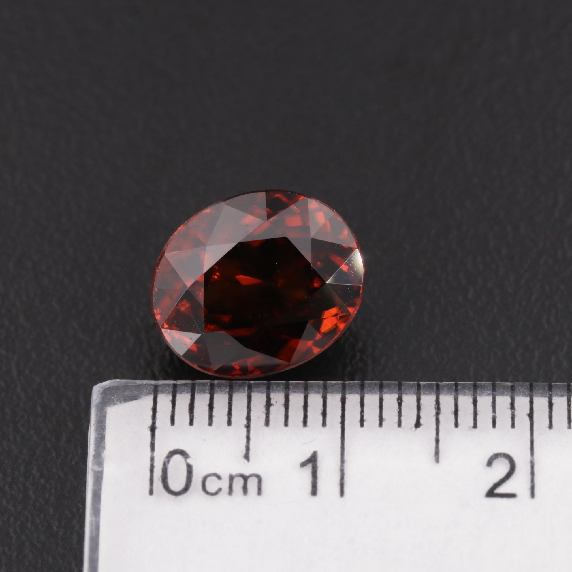 Loose 8.25 CT Oval Faceted Red Zircon