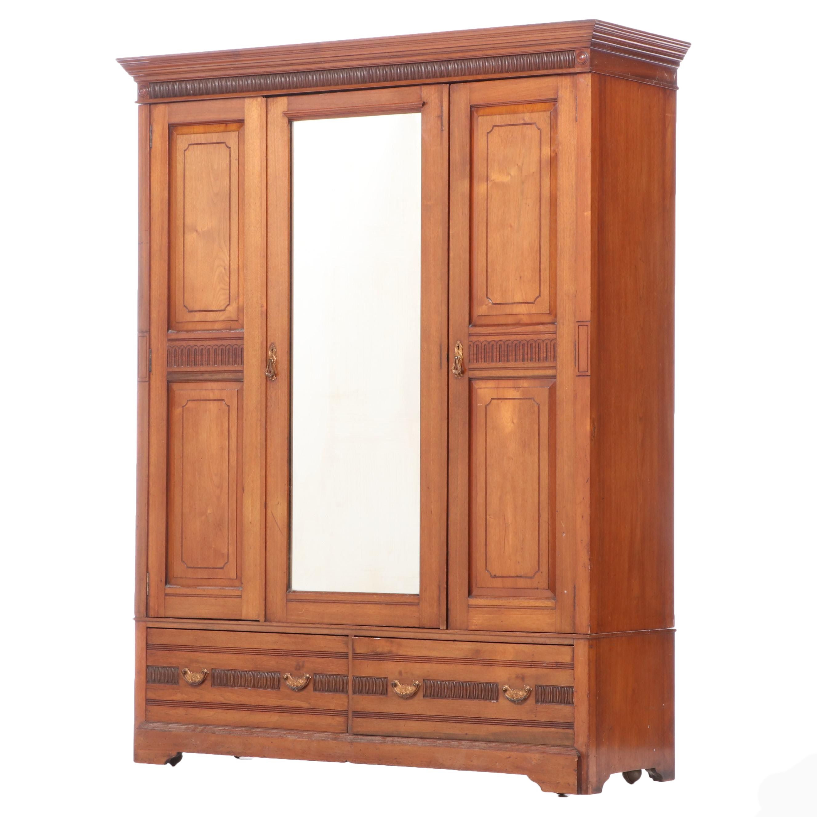 T. Simpson & Sons Victorian Eastlake Walnut Wardrobe, Late 19th Century
