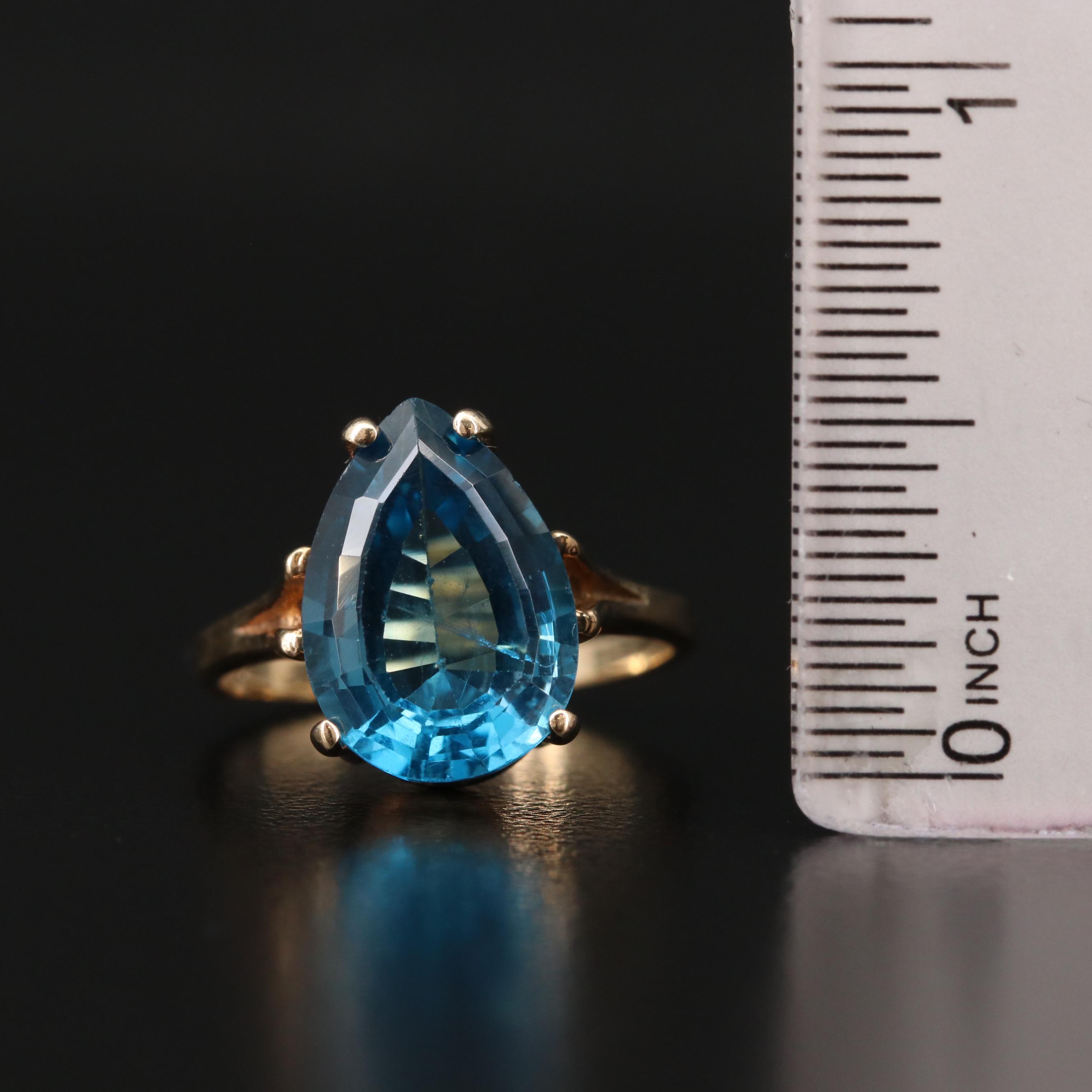 10K Yellow Gold Blue Topaz Ring