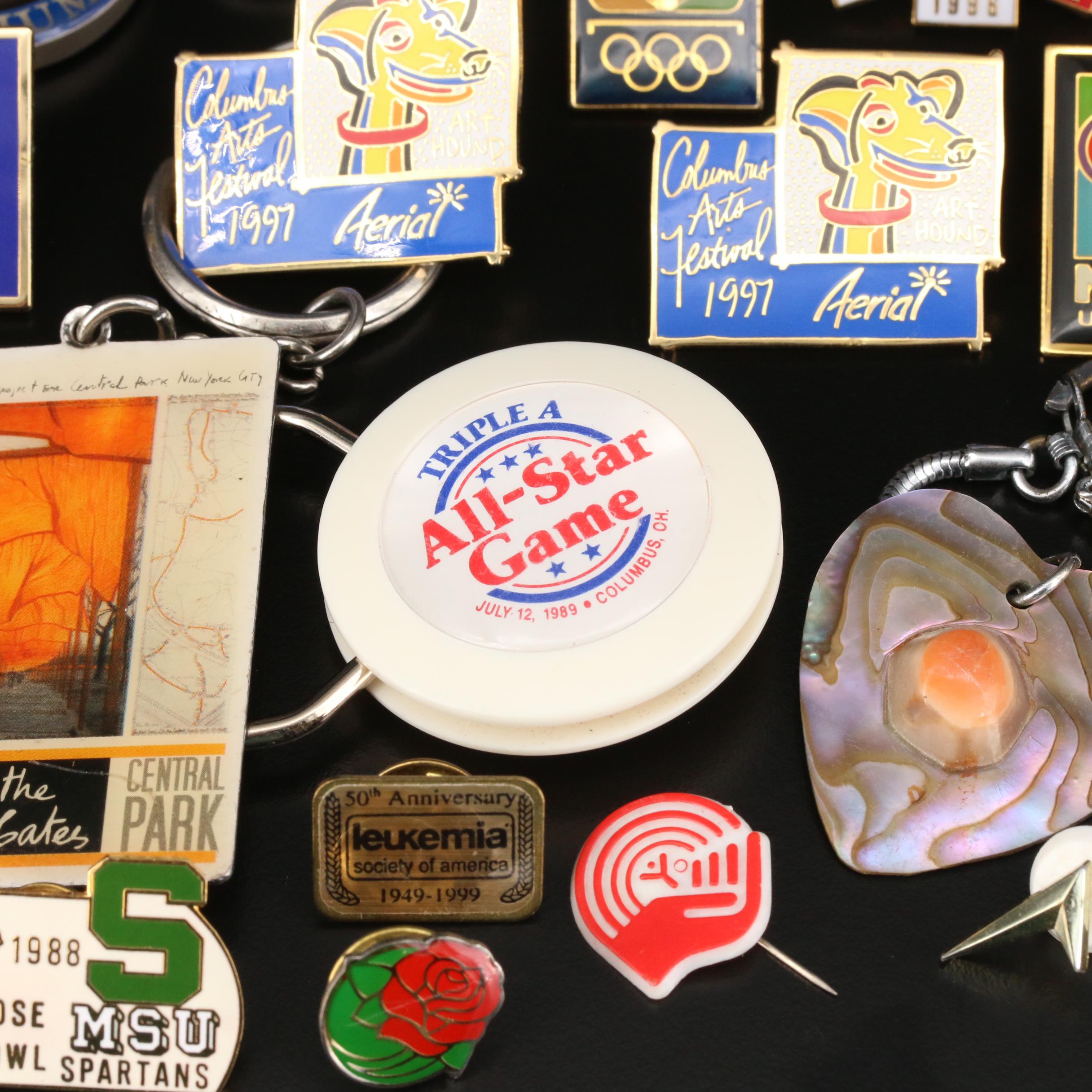 Selection of Pins Featuring 1996 Atlanta Olympics, Disney and Keychains