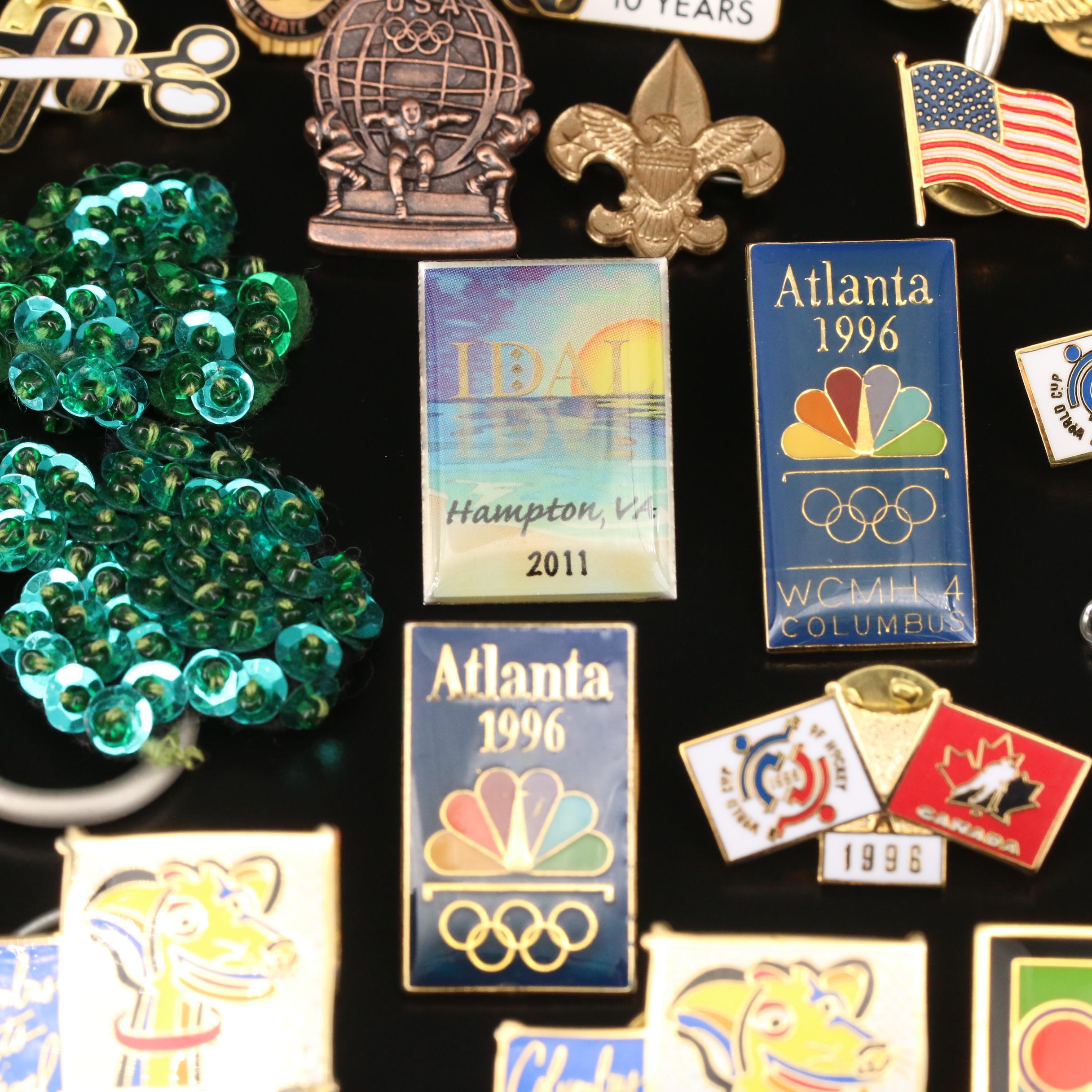 Selection of Pins Featuring 1996 Atlanta Olympics, Disney and Keychains