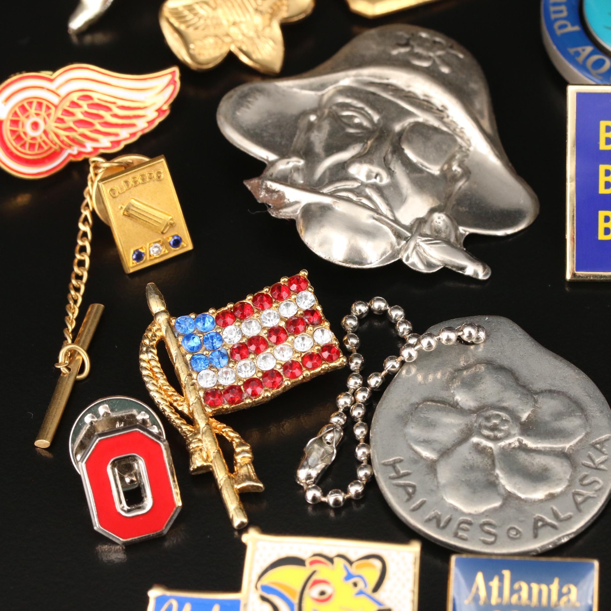Selection of Pins Featuring 1996 Atlanta Olympics, Disney and Keychains
