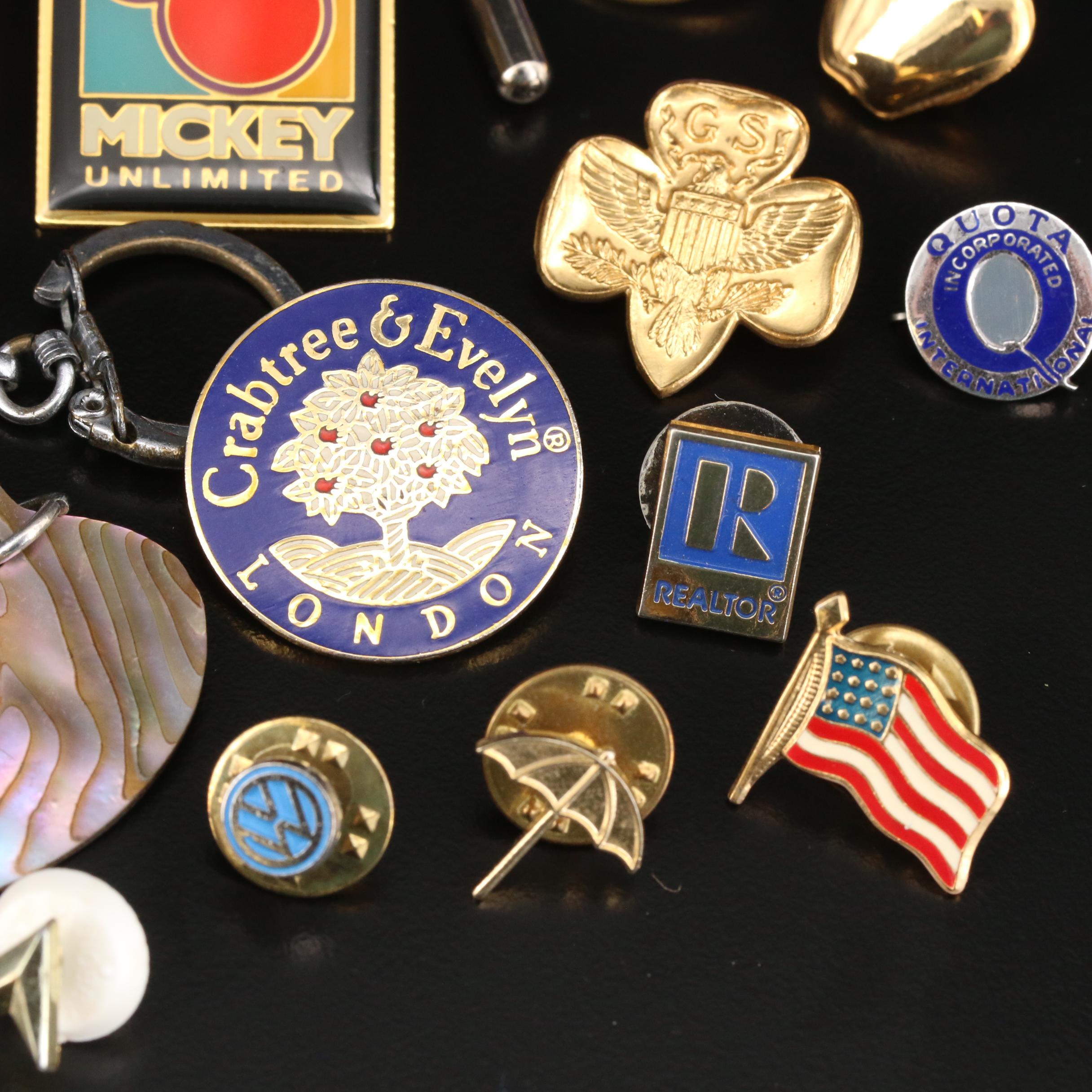 Selection of Pins Featuring 1996 Atlanta Olympics, Disney and Keychains