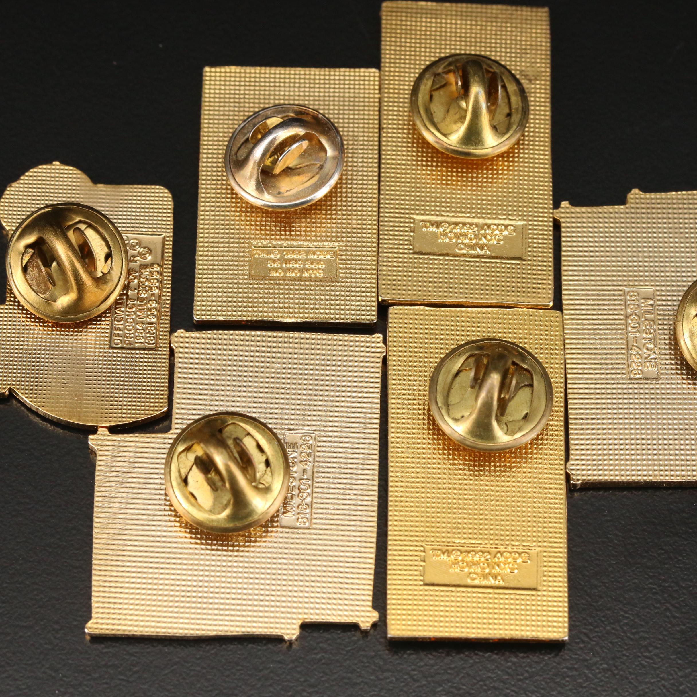 Selection of Pins Featuring 1996 Atlanta Olympics, Disney and Keychains