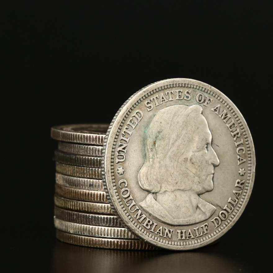 Eleven 1893 Columbian Exposition Commemorative Silver Half Dollars
