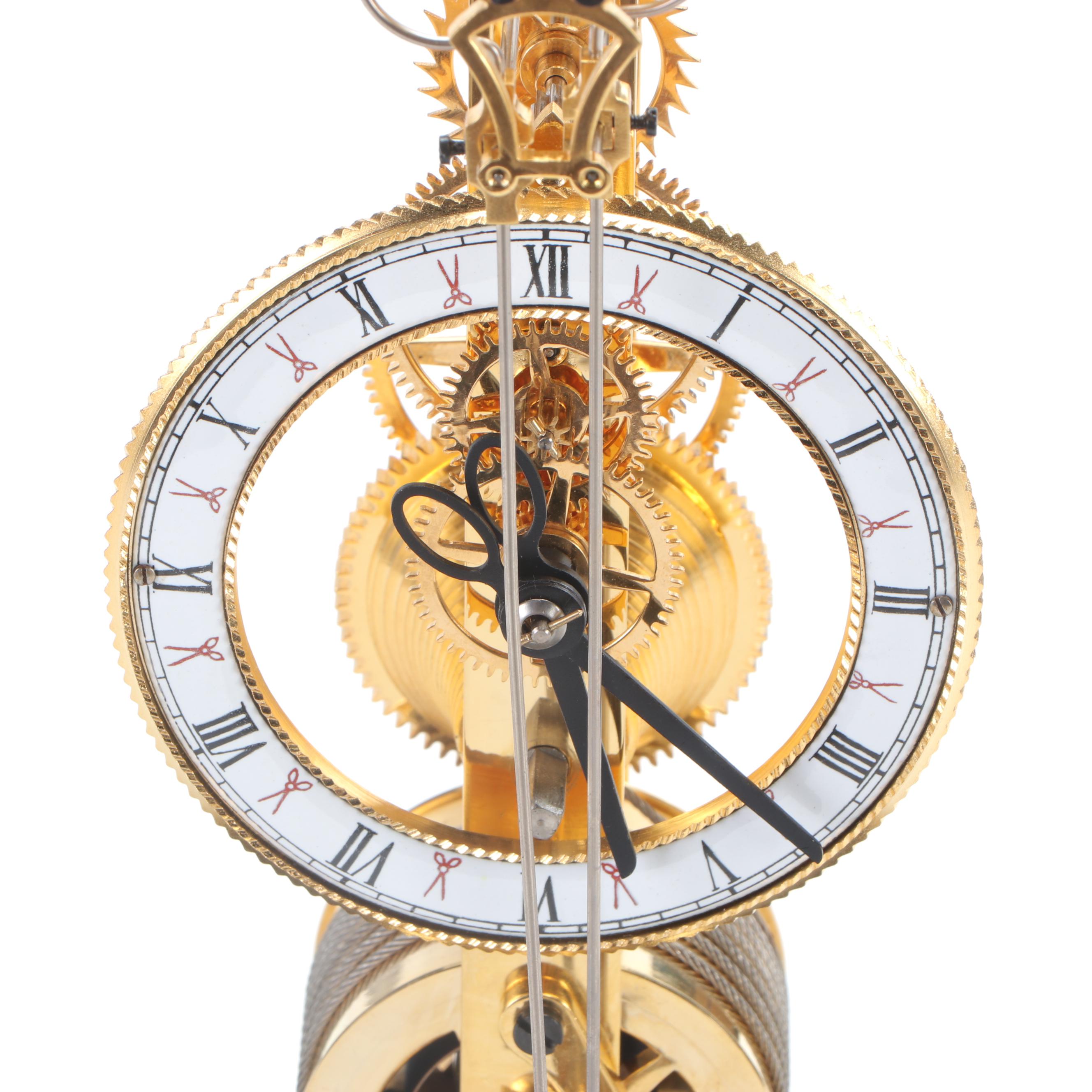 Glass Cased Skeleton Clock with Scissor Pendulum