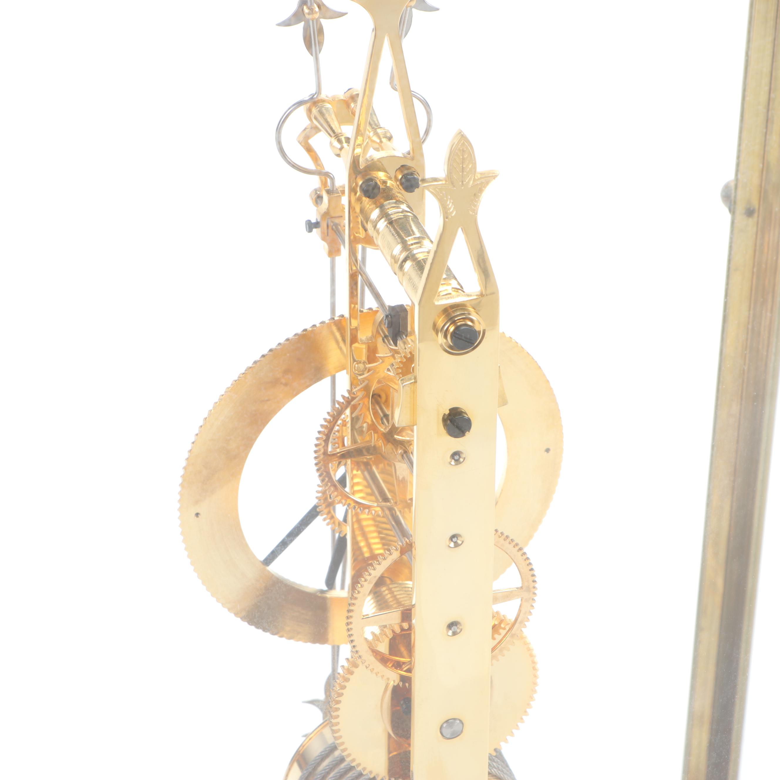 Glass Cased Skeleton Clock with Scissor Pendulum