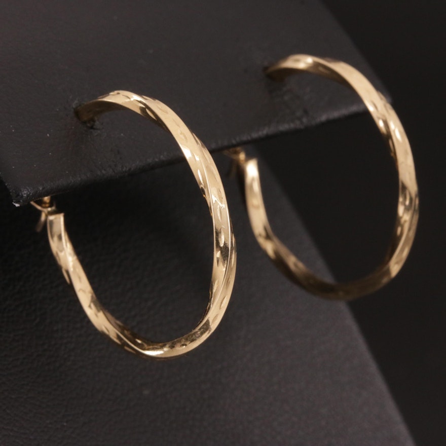 10K Hoop Earrings Featuring Twisting Motif