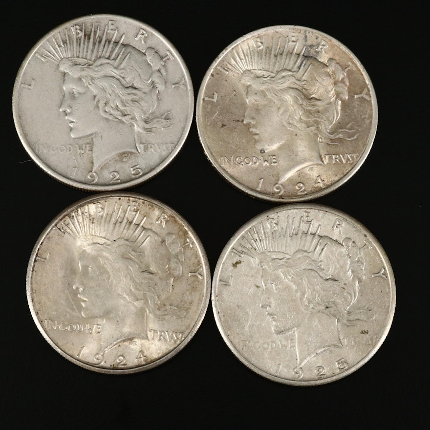 Four Peace Silver Dollars