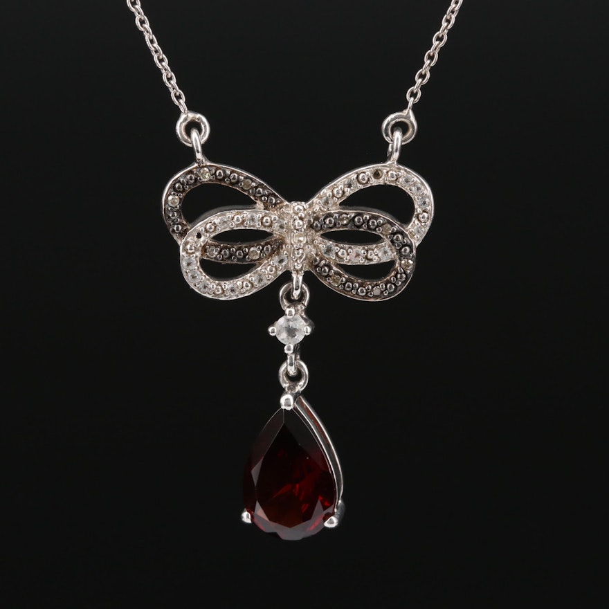 Sterling Silver Garnet, Diamond, and White Spinel Ribbon Pendant Necklace