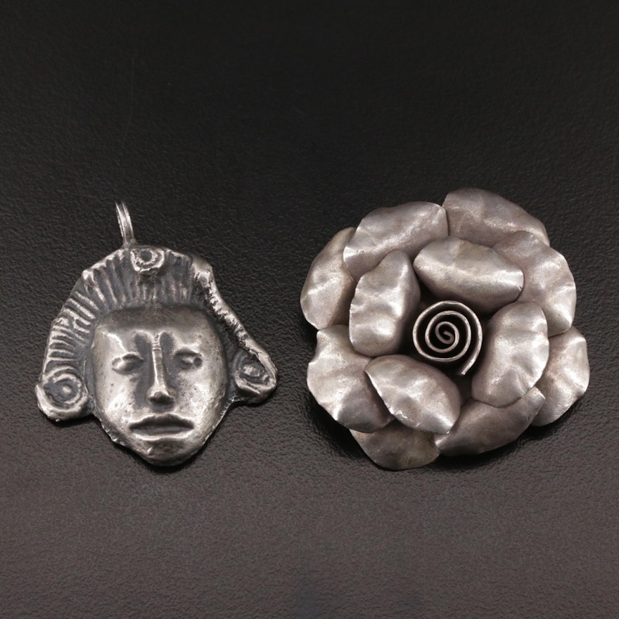 Aztec Style Figural Pendant and Fine Silver Floral Pendant