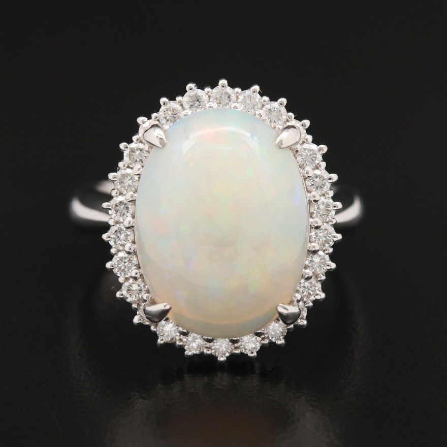 Platinum 6.21 CT Opal and Diamond Halo Ring