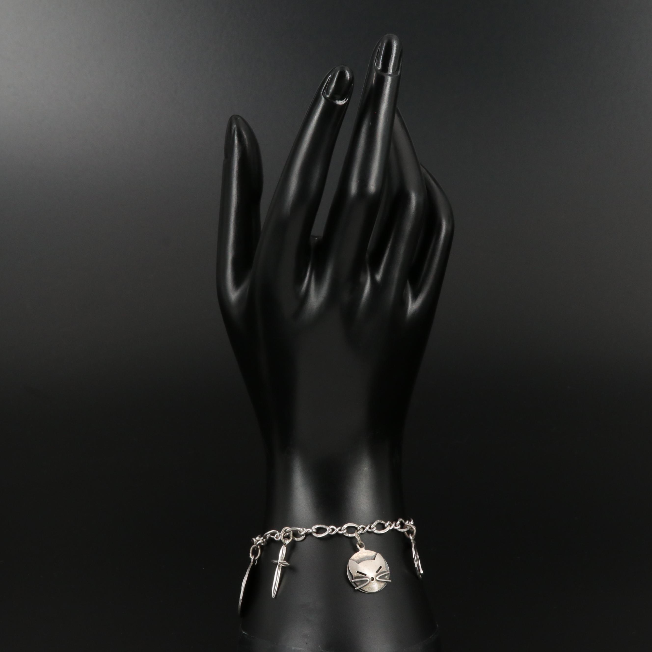 Sterling Silver Charm Bracelet Featuring Enamel Accents