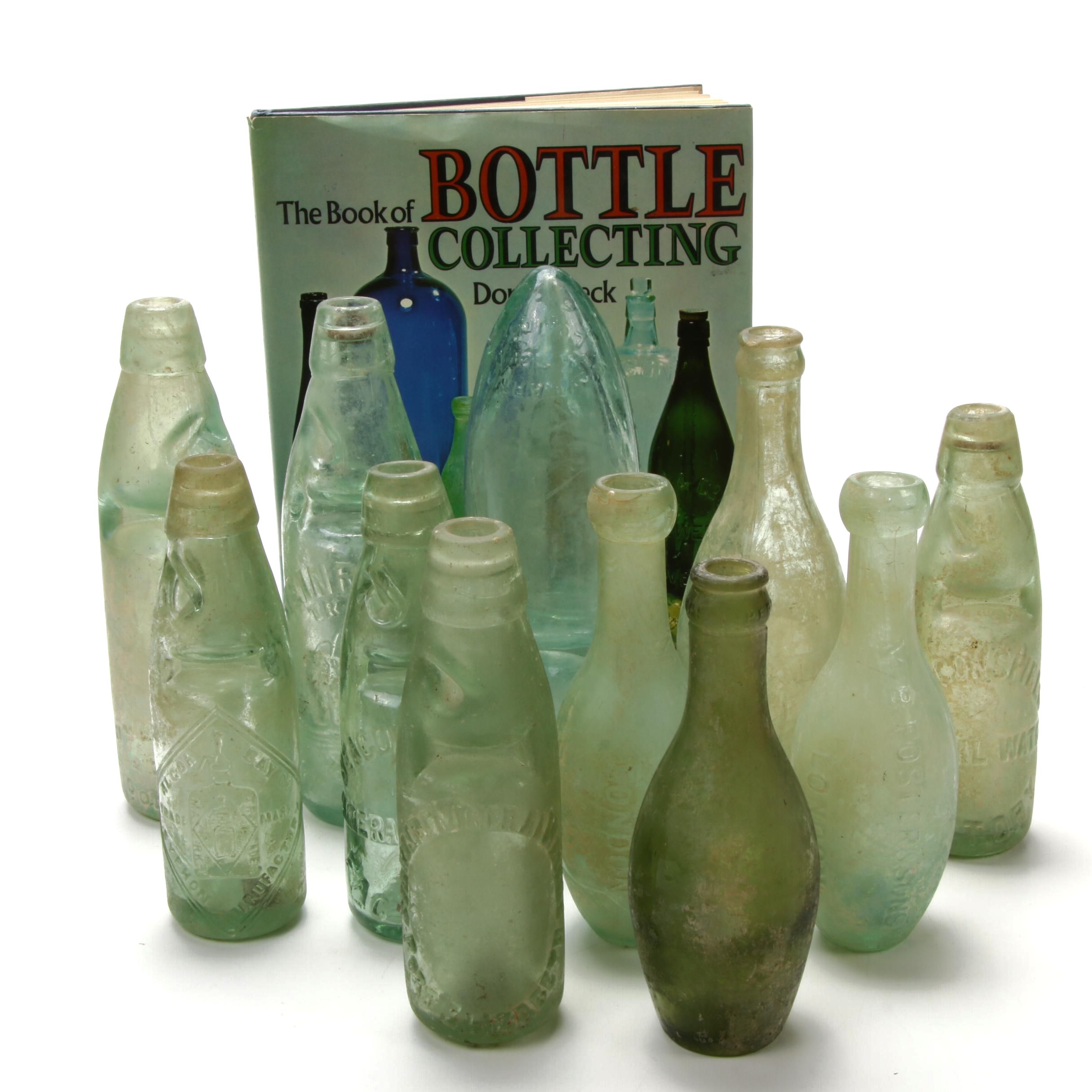 Antique Aqua Mineral and Soda Water Bottles and Book