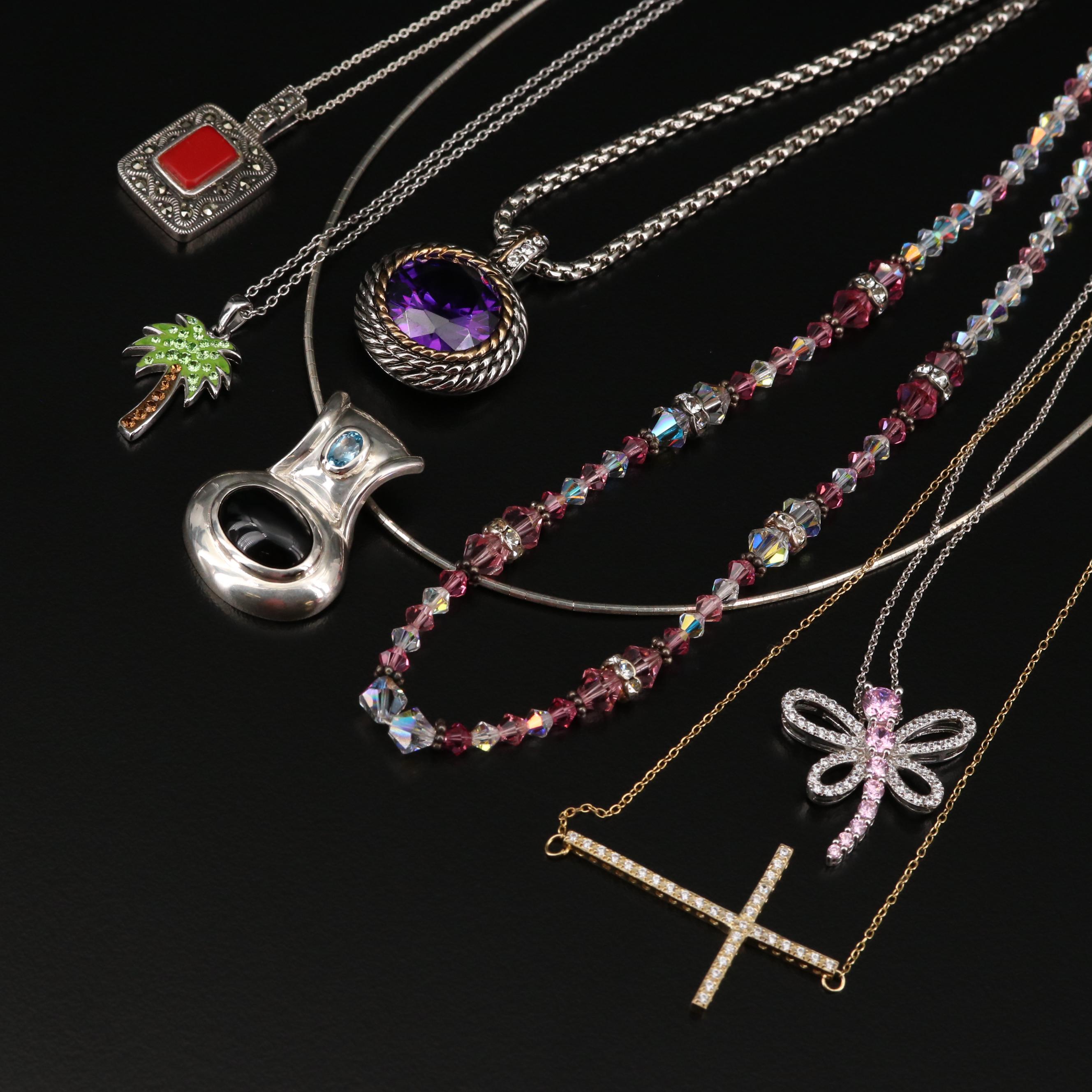 Collection of Sterling Silver Necklaces Including Cross and Dragonfly Pendants