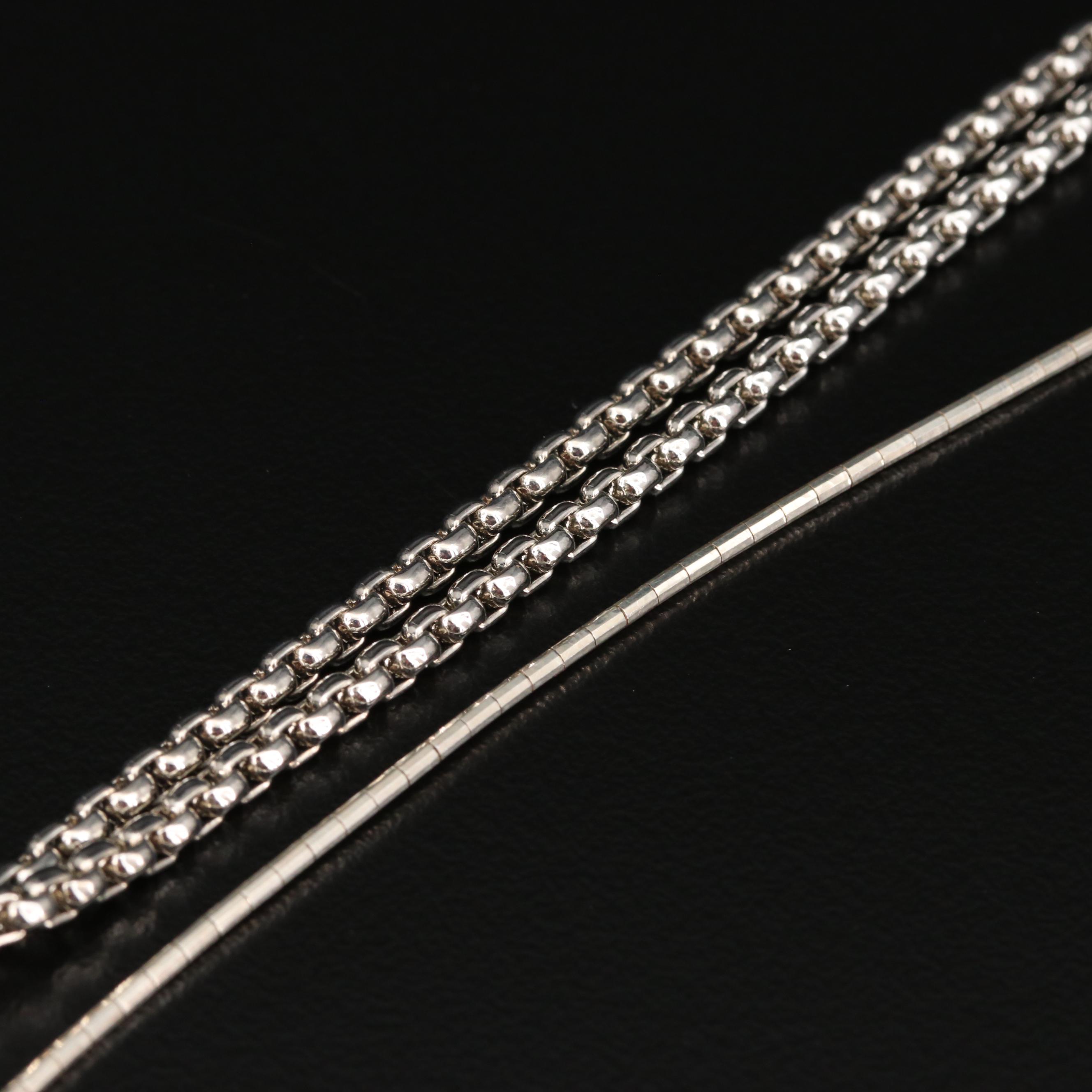 Collection of Sterling Silver Necklaces Including Cross and Dragonfly Pendants