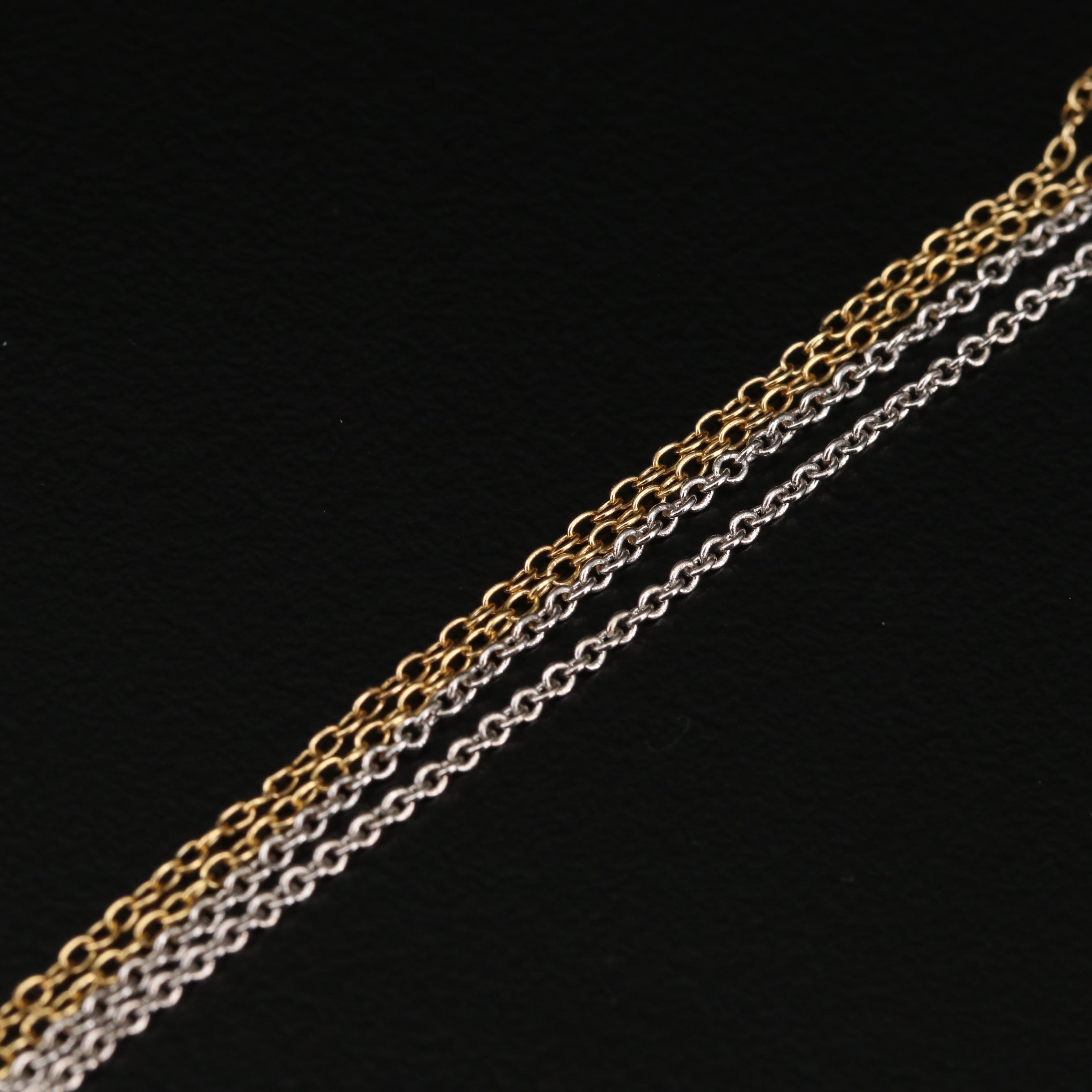 Collection of Sterling Silver Necklaces Including Cross and Dragonfly Pendants