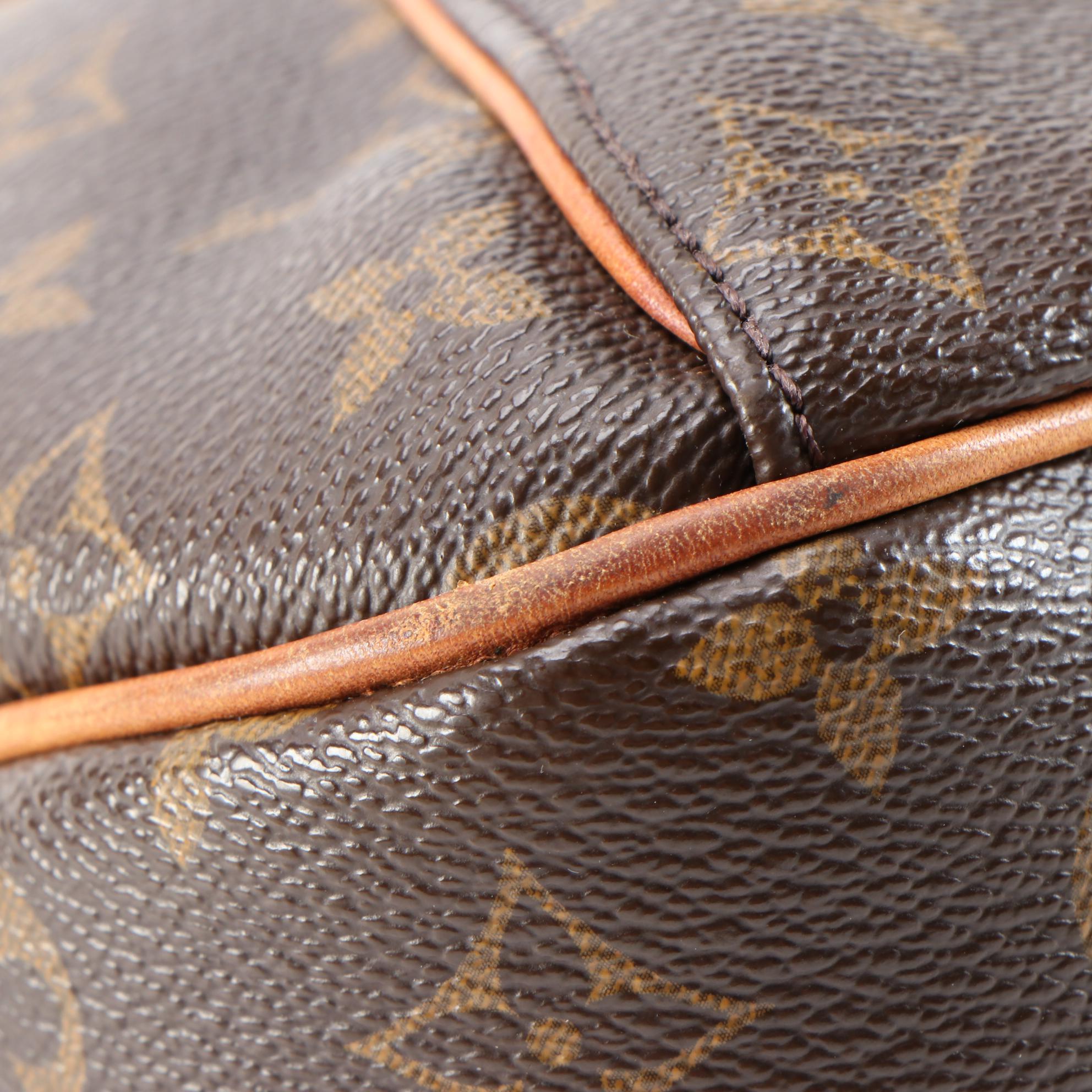 Louis Vuitton Inventeur Shoulder Bag in Monogram Coated Canvas and Leather