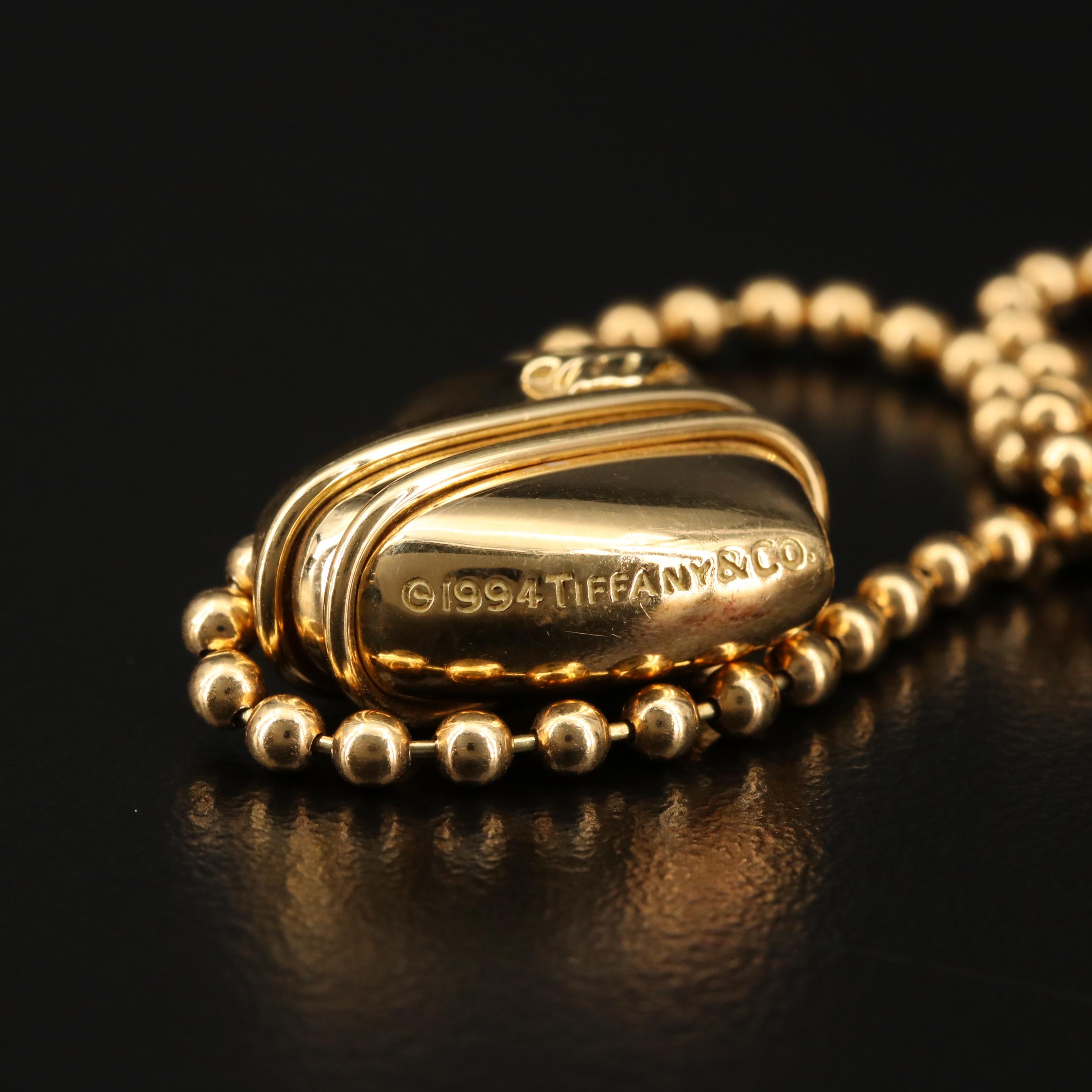 Tiffany & Co. "Cupids Arrow" 18K Heart Necklace