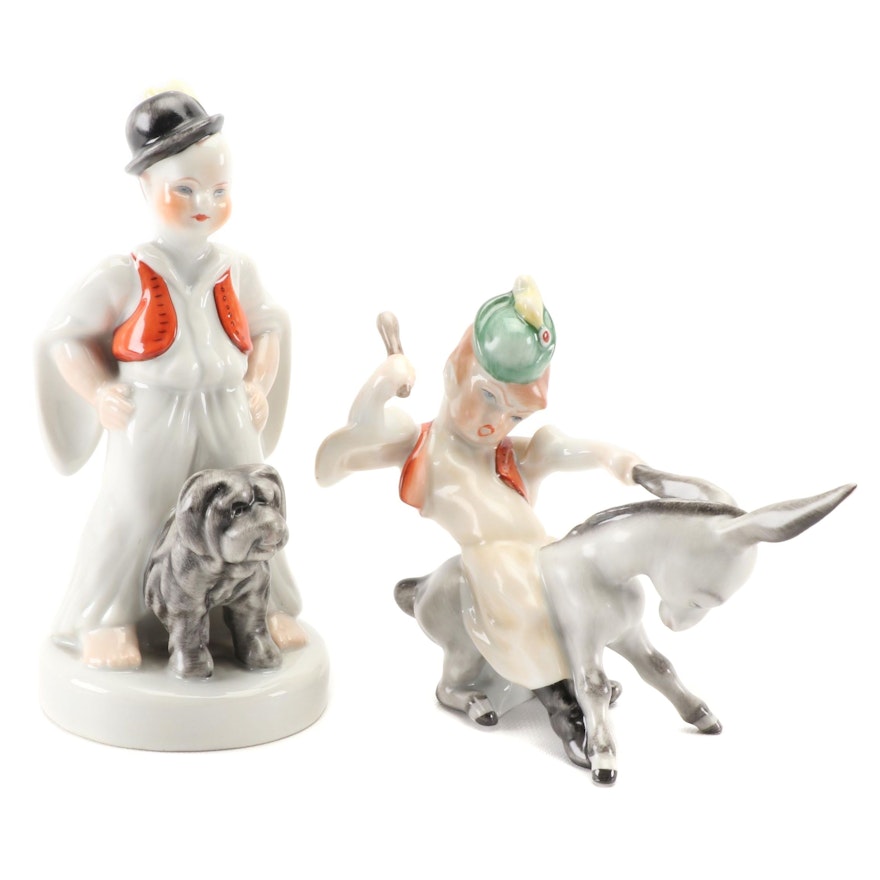 Herend "Peasant Boy Riding Donkey" and "Boy With Puli Dog" Porcelain Figurines