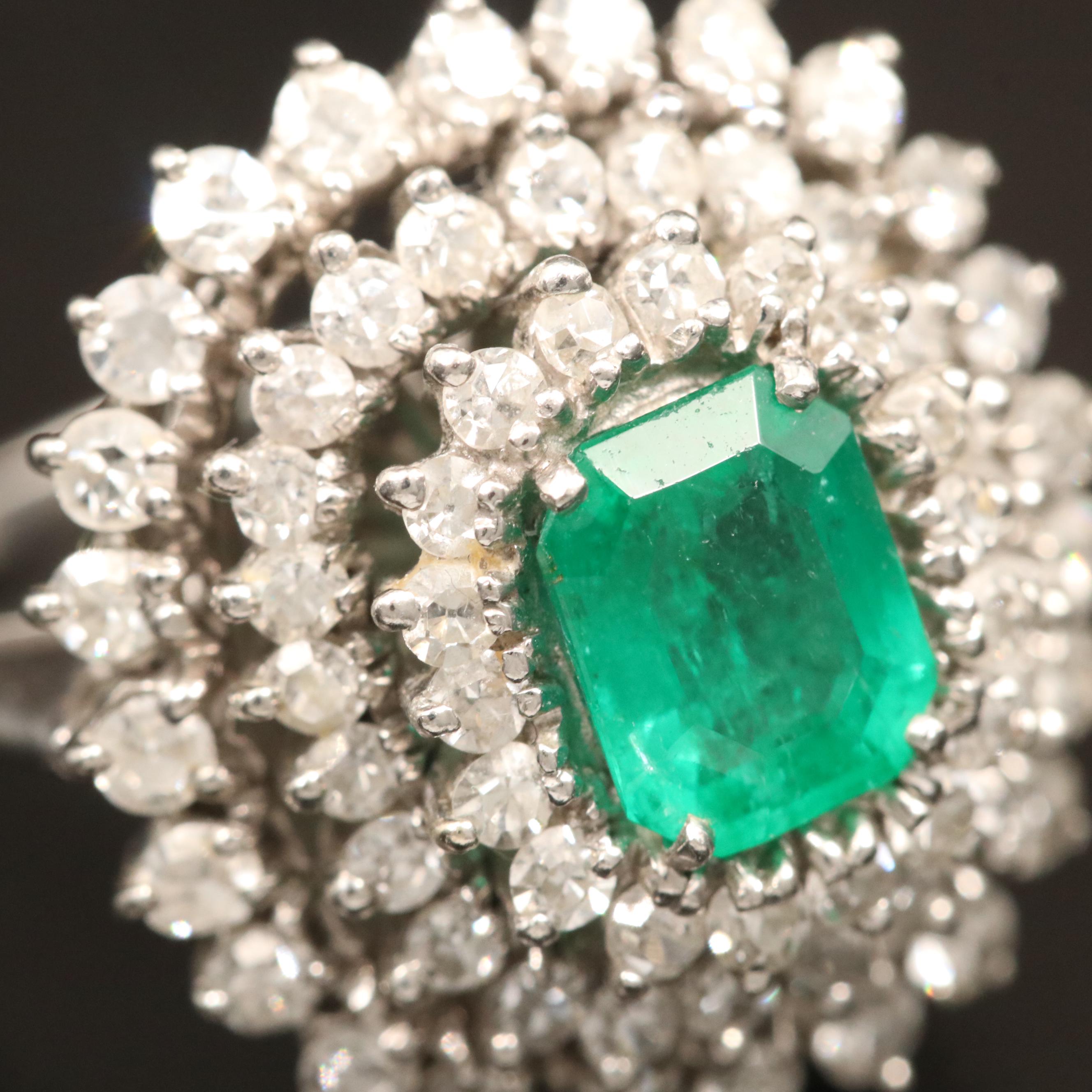 Vintage Platinum 1.09 CT Emerald and 2.00 CTW Diamond Triple Halo Ring