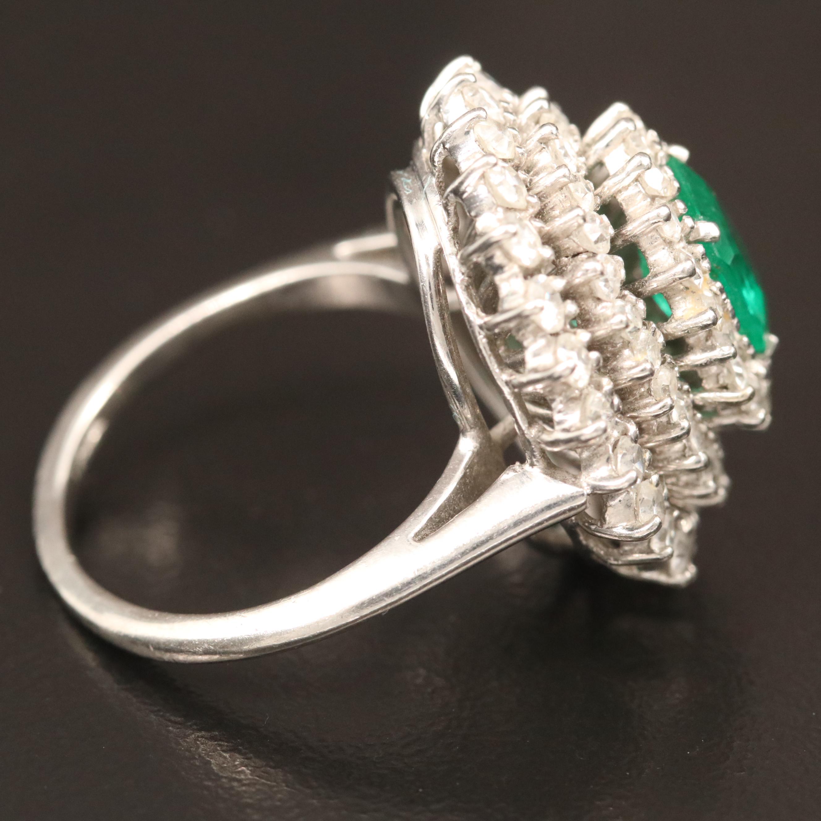Vintage Platinum 1.09 CT Emerald and 2.00 CTW Diamond Triple Halo Ring