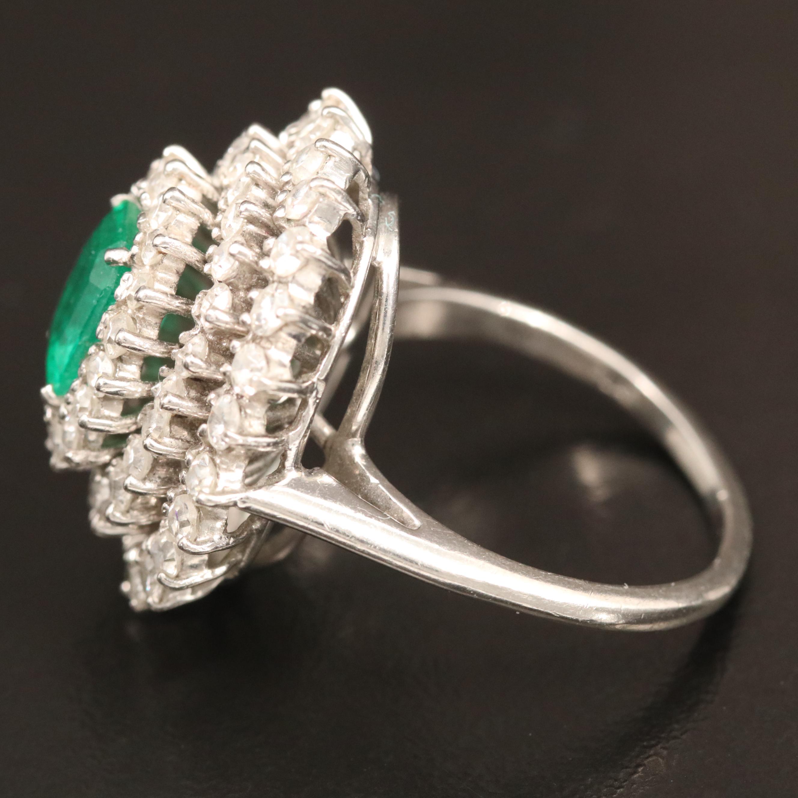 Vintage Platinum 1.09 CT Emerald and 2.00 CTW Diamond Triple Halo Ring