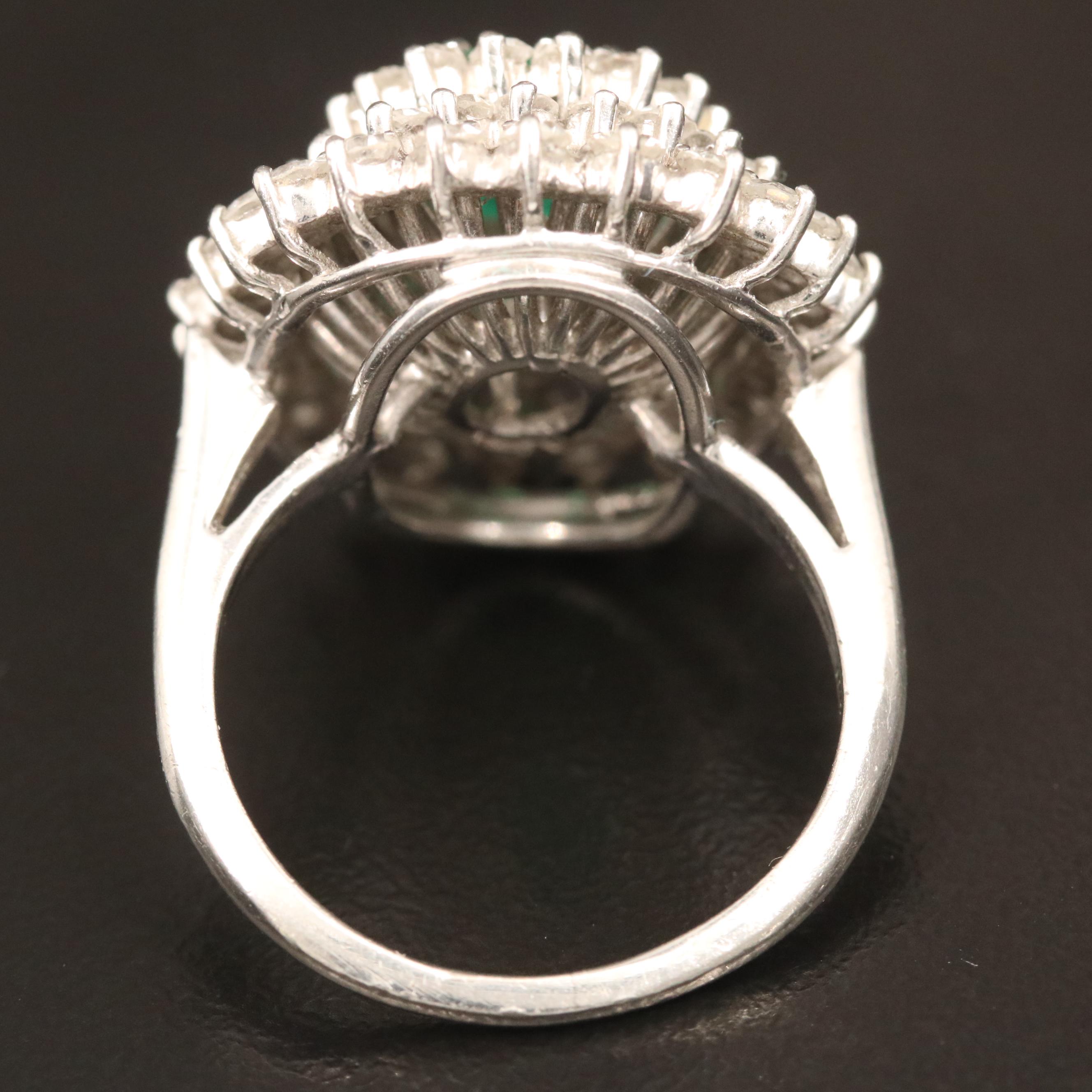 Vintage Platinum 1.09 CT Emerald and 2.00 CTW Diamond Triple Halo Ring