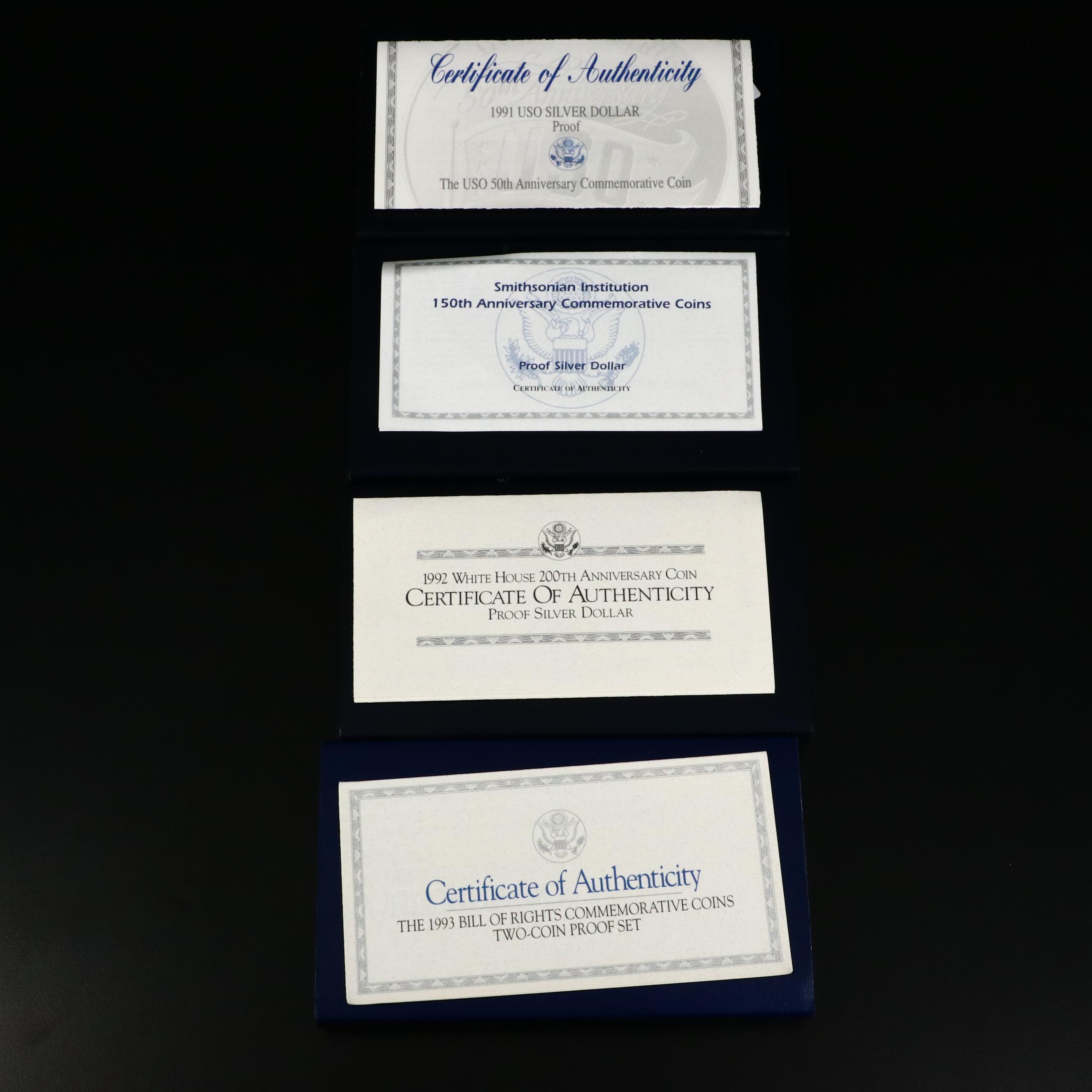 Four Modern U.S. Commemorative Proof Silver Dollars and One Proof Half Dollar