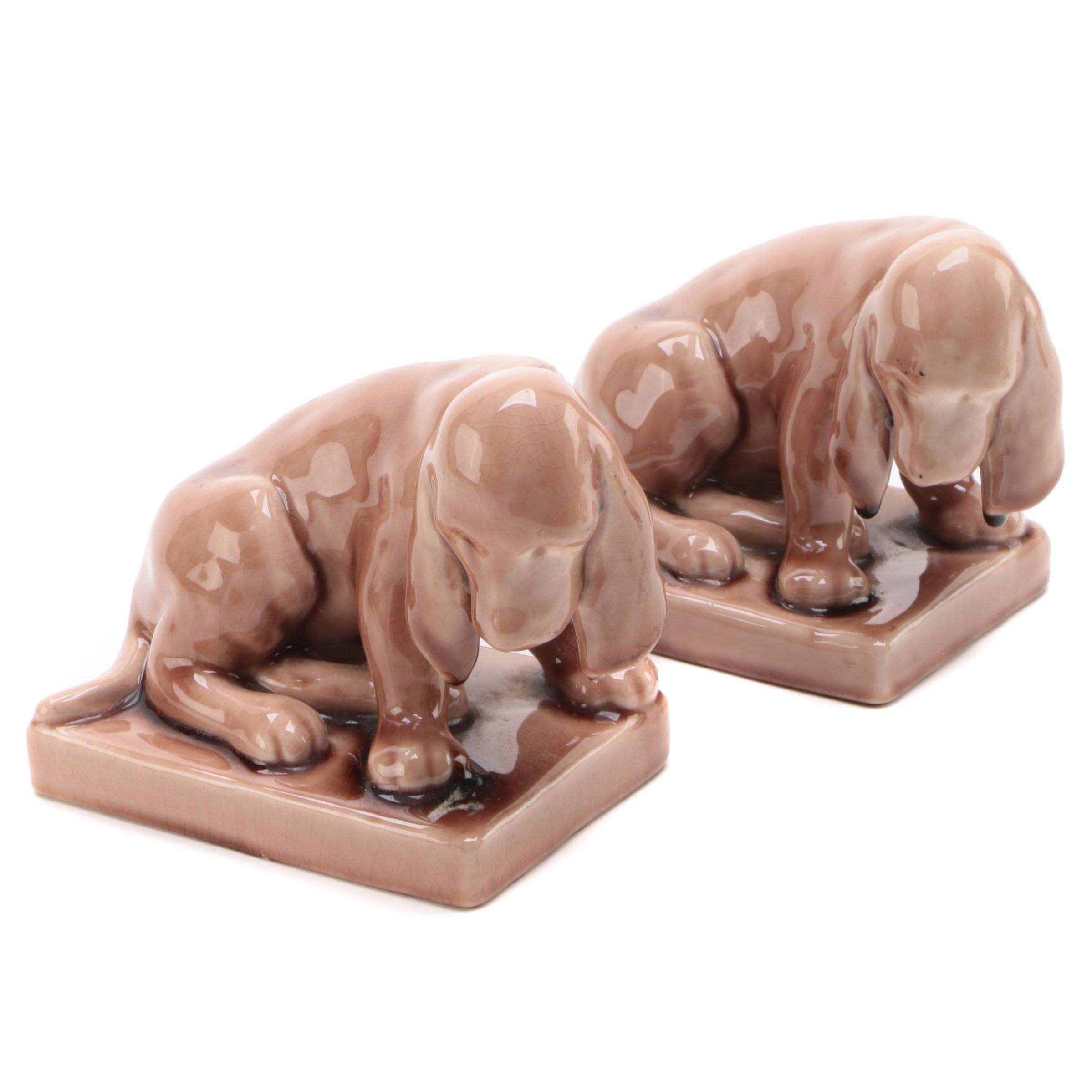 Pair of Rookwood Pottery Wine Madder Glaze Hound Dog Bookends, 1950