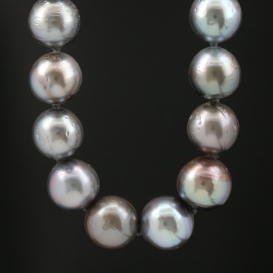 Knotted Strand of Pearls with 14K Clasp