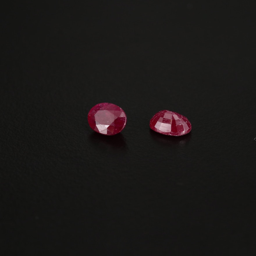 Matched Pair of Loose 2.47 CTW Oval Faceted Rubies