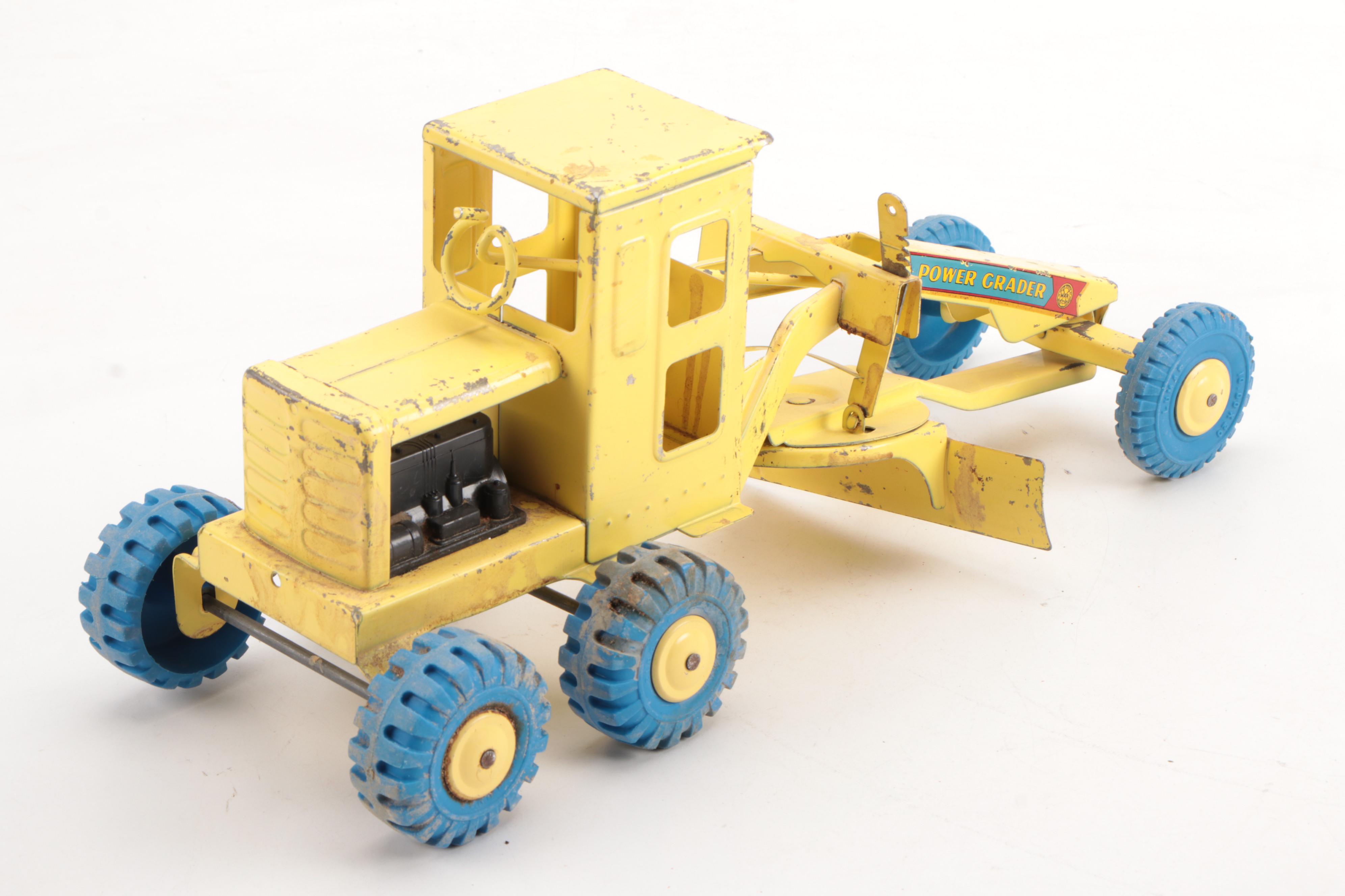 Marx Power Crader and Structo Pressed Steel Package Delivery Truck, Mid-20th C.