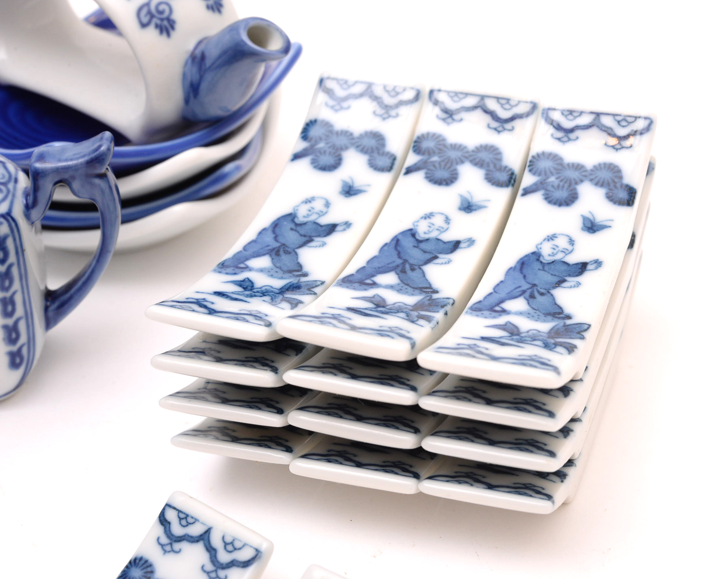 Chinese Hand-Painted Porcelain Napkin Rings, Knife Rests and Salts