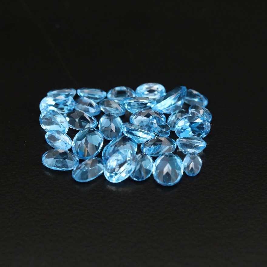 Loose 15.74 CTW Oval Faceted Blue Topaz