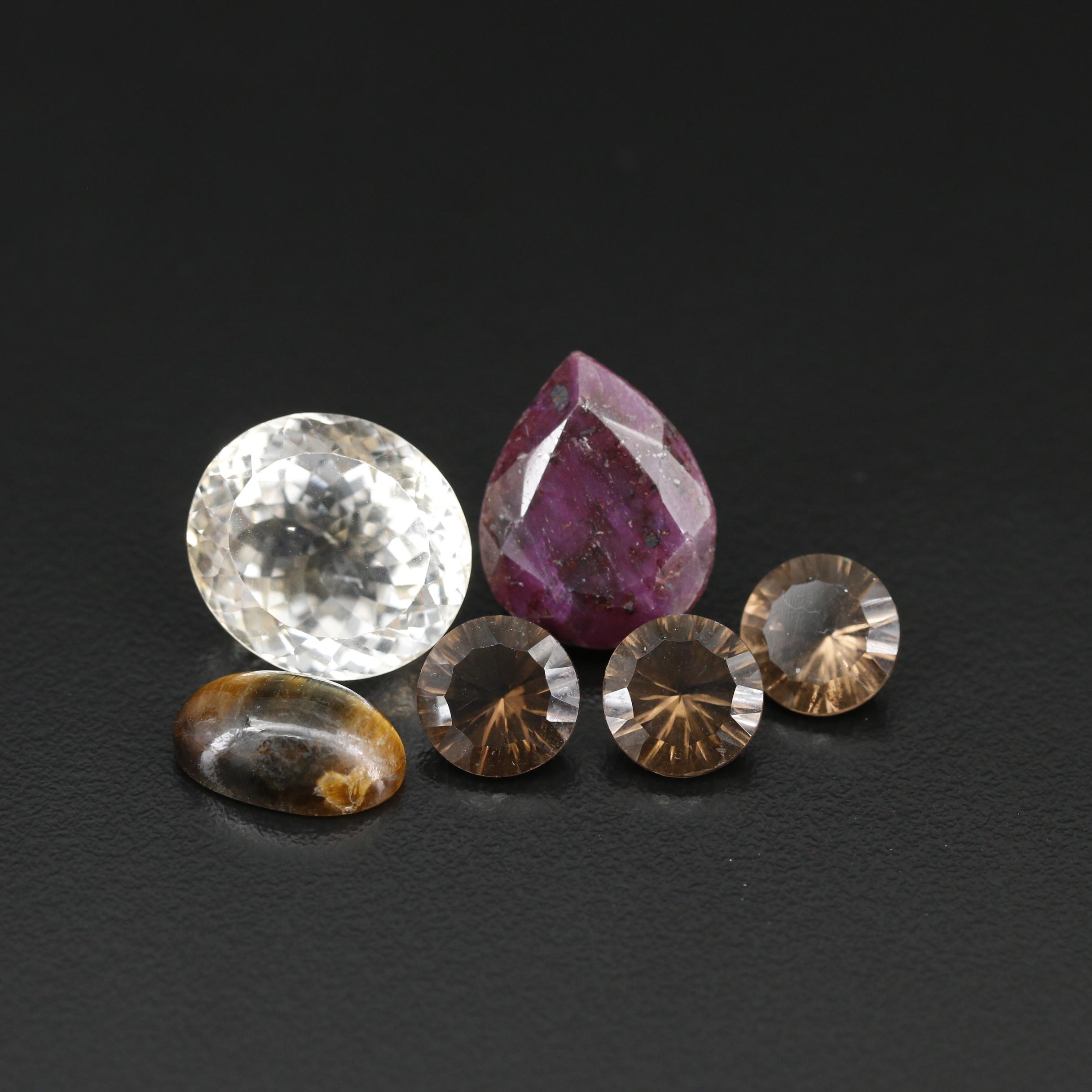 Loose Mixed Gemstones Including Ruby, Smoky Quartz and Tiger's Eye