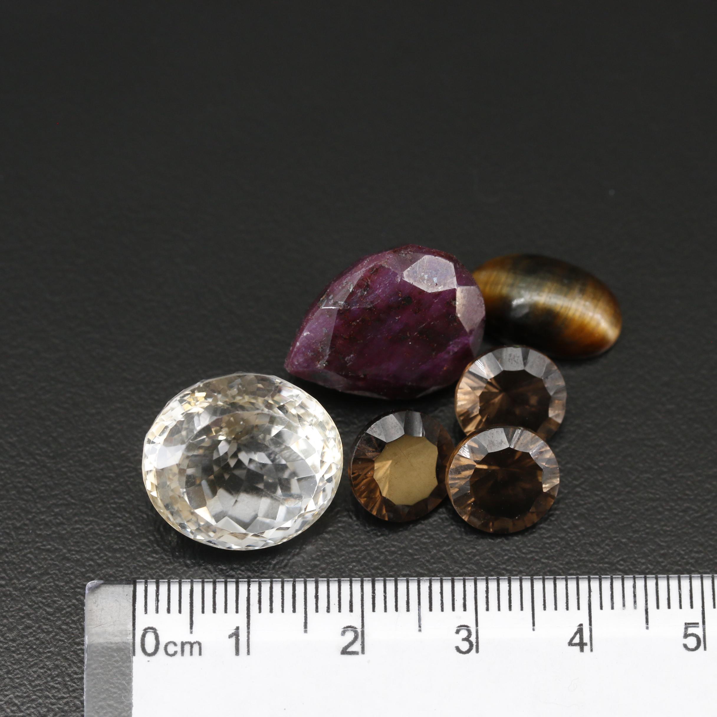 Loose Mixed Gemstones Including Ruby, Smoky Quartz and Tiger's Eye