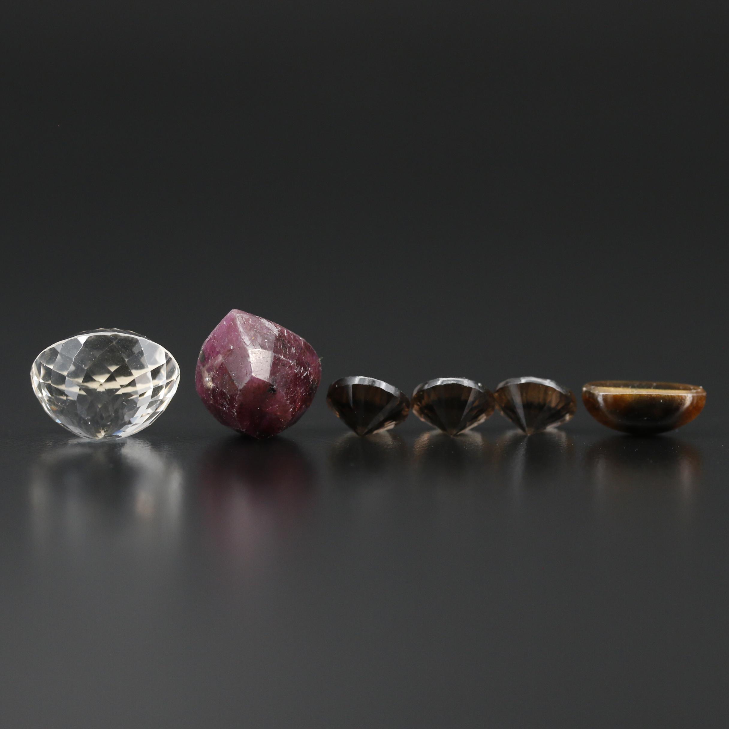 Loose Mixed Gemstones Including Ruby, Smoky Quartz and Tiger's Eye